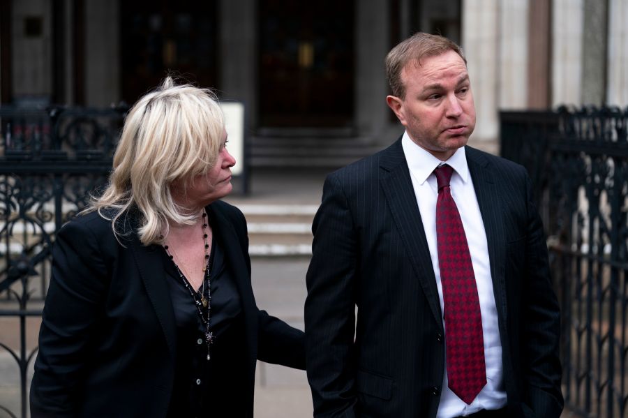 Financial market trader Tom Hayes walks with his lawyer Karen Todner, left, outside the Royal Courts Of Justice in London after two former financial market traders convicted of interest rate benchmark manipulation have had bids to clear their names rejected by the Court of Appeal, on Wednesday March 27, 2024. Tom Hayes, 44, a former Citigroup and UBS trader, was found guilty of multiple counts of conspiracy to defraud over manipulating the London Inter-Bank Offered Rate (Libor) between 2006 and 2010. His case, alongside that of another similarly jailed trader Carlo Palombo, 45, were referred to the court by the Criminal Cases Review Commission (CCRC), which investigates potential miscarriages of justice. (Jordan Pettitt/PA via AP)