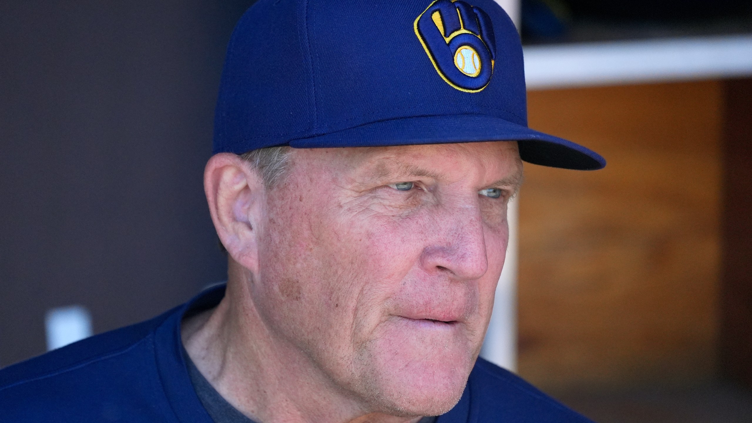 Milwaukee Brewers manager Pat Murphy pauses in the dugout prior to a spring training baseball game against the Colorado Rockies, Monday, March 25, 2024, in Phoenix. (AP Photo/Ross D. Franklin)