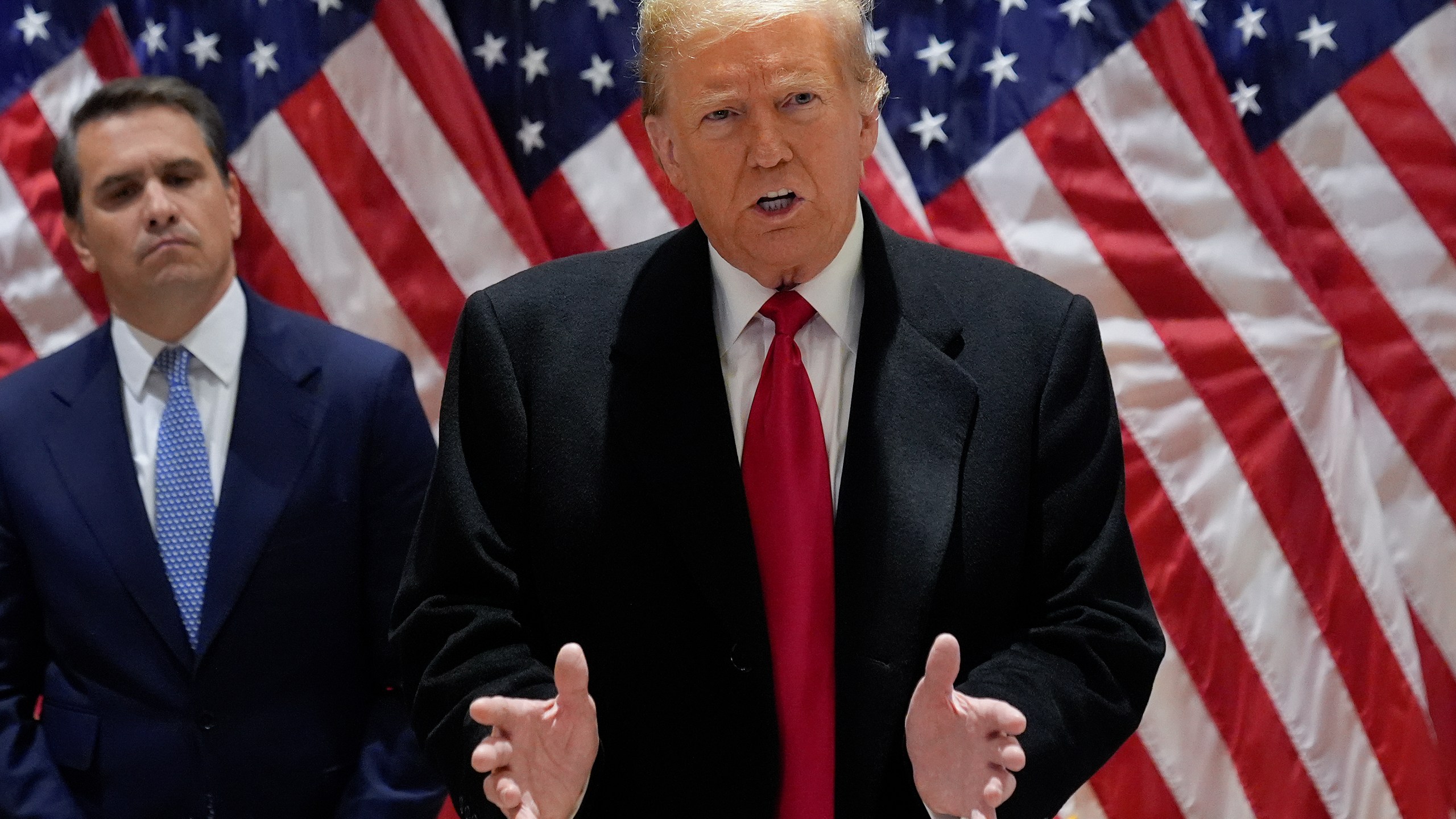 Former President Donald Trump speaks during a press conference at 40 Wall Street after a pre-trial hearing at Manhattan criminal court, Monday, March 25, 2024, in New York. A New York judge has scheduled an April 15 trial date in former President Donald Trump's hush money case. Judge Juan M. Merchan made the ruling Monday.(AP Photo/Frank Franklin II)