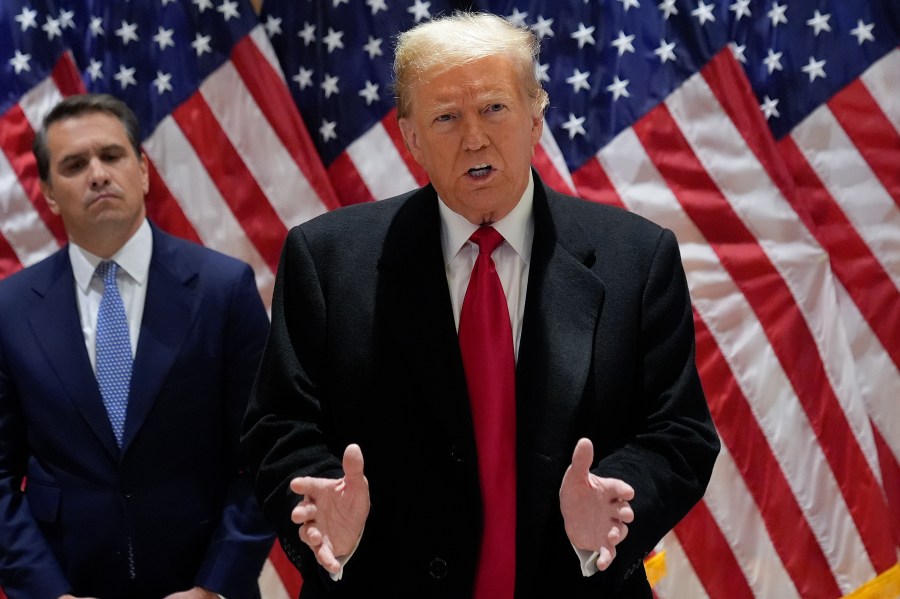 Former President Donald Trump speaks during a press conference at 40 Wall Street after a pre-trial hearing at Manhattan criminal court, Monday, March 25, 2024, in New York. A New York judge has scheduled an April 15 trial date in former President Donald Trump's hush money case. Judge Juan M. Merchan made the ruling Monday.(AP Photo/Frank Franklin II)