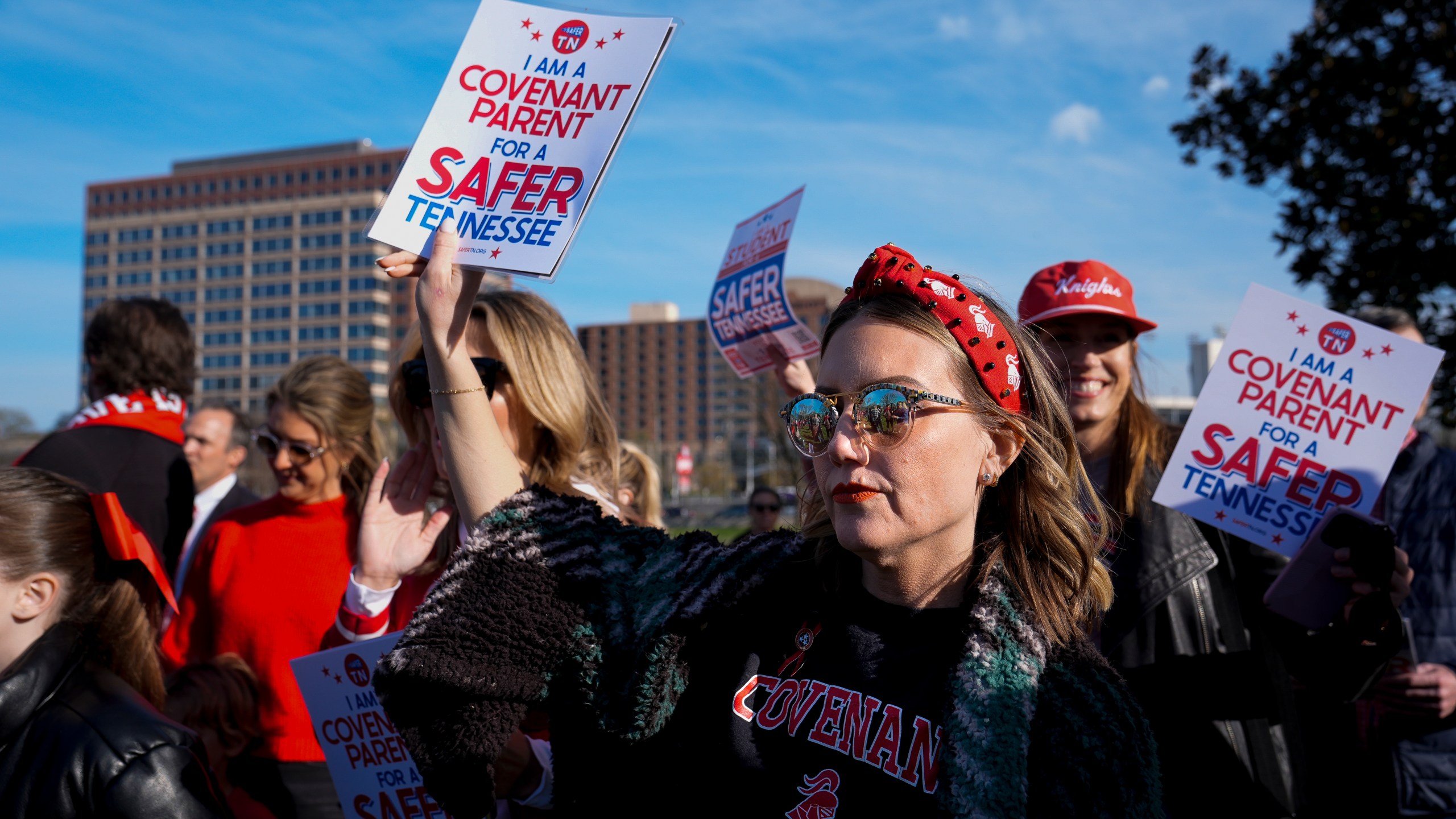 Covenant School mother Melissa Alexander attends the Linking Arms for Change human chain Wednesday, March 27, 2024, in Nashville, Tenn. The event was to commemorate the one-year anniversary of the mass shooting at the school. (AP Photo/George Walker IV)