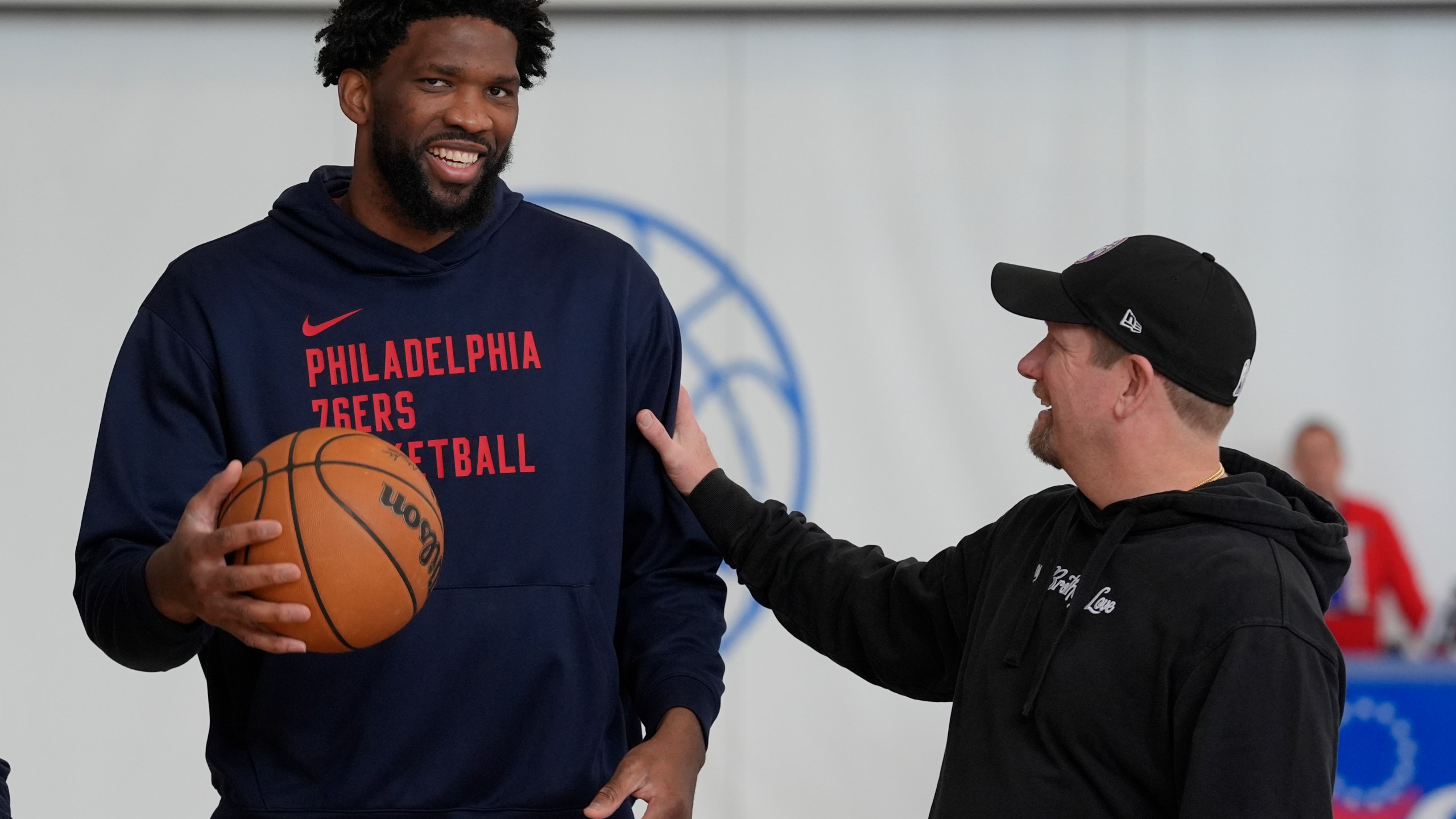 Philadelphia 76ers center Joel Embiid and head coach Nick Nurse meet at the NBA basketball team's practice facility, Thursday, Feb. 29, 2024, in Camden, N.J. (AP Photo/Matt Rourke)