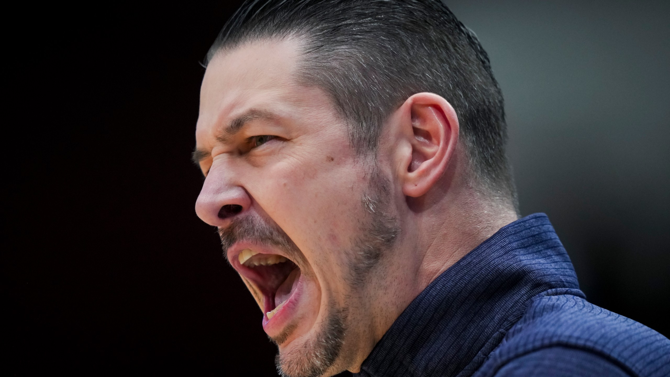 Montana State coach Matt Logie shouts during the first half of the team's First Four game against Grambling State in the NCAA men's college basketball tournament Wednesday, March 20, 2024, in Dayton, Ohio. (AP Photo/Aaron Doster)