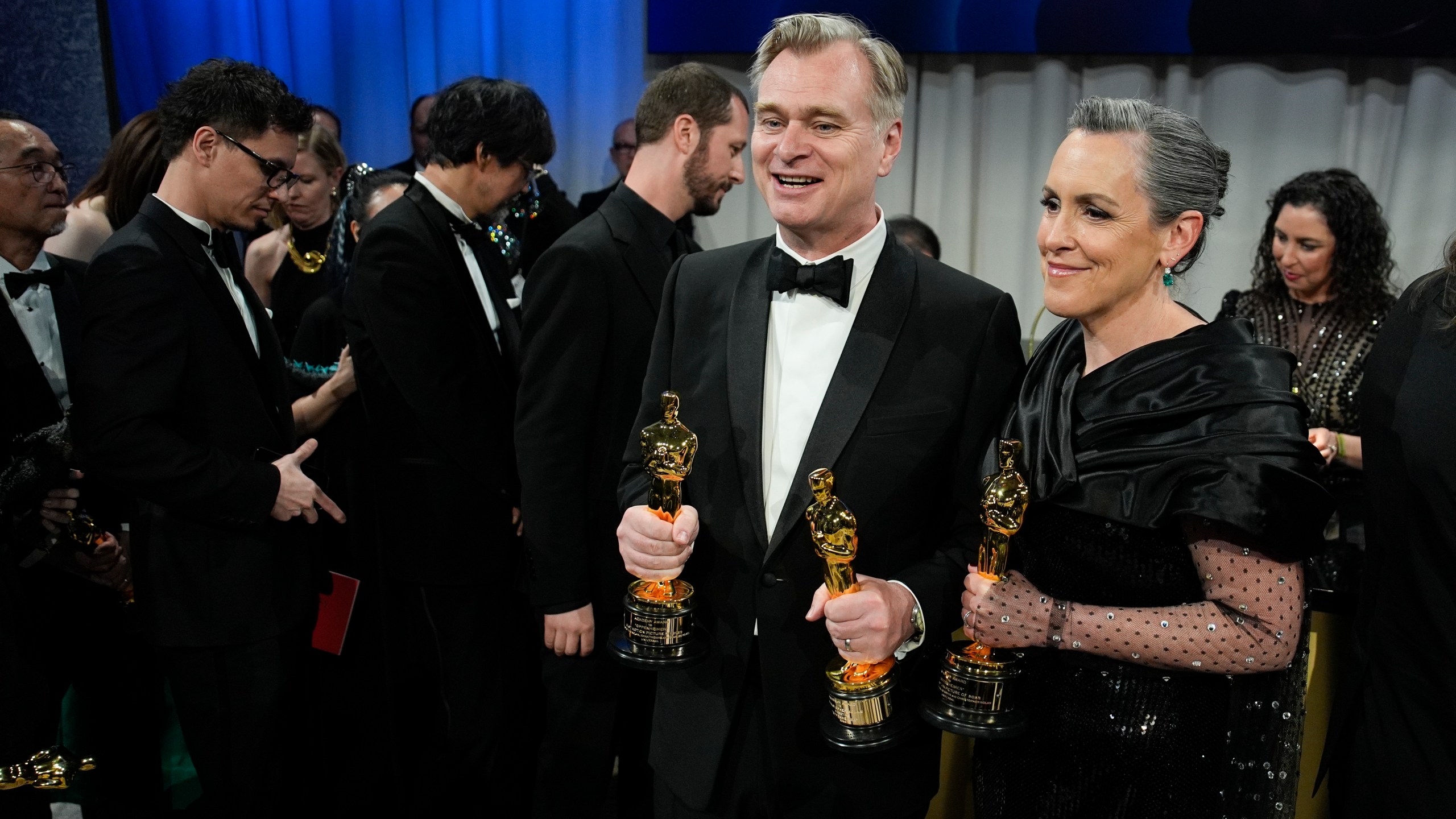 Christopher Nolan, winner of the awards for best director and best picture for "Oppenheimer," left, and Emma Thomas, winner of the award for best picture for "Oppenheimer" pose at the Governors Ball after the Oscars on Sunday, March 10, 2024, at the Dolby Theatre in Los Angeles. (AP Photo/John Locher)