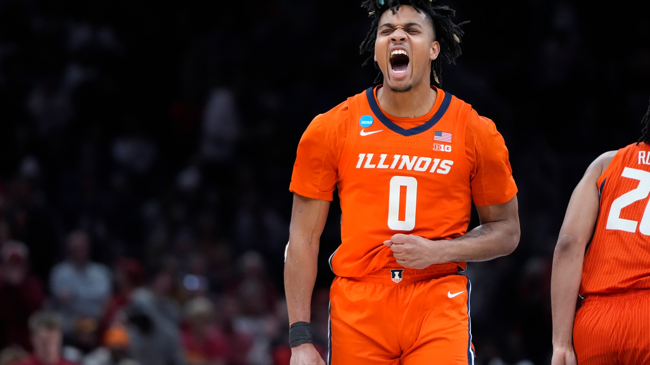 Illinois guard Terrence Shannon Jr. (0) celebrates after a basket against Iowa State during the first half of the Sweet 16 college basketball game in the men's NCAA Tournament, Thursday, March 28, 2024, in Boston. (AP Photo/Michael Dwyer)