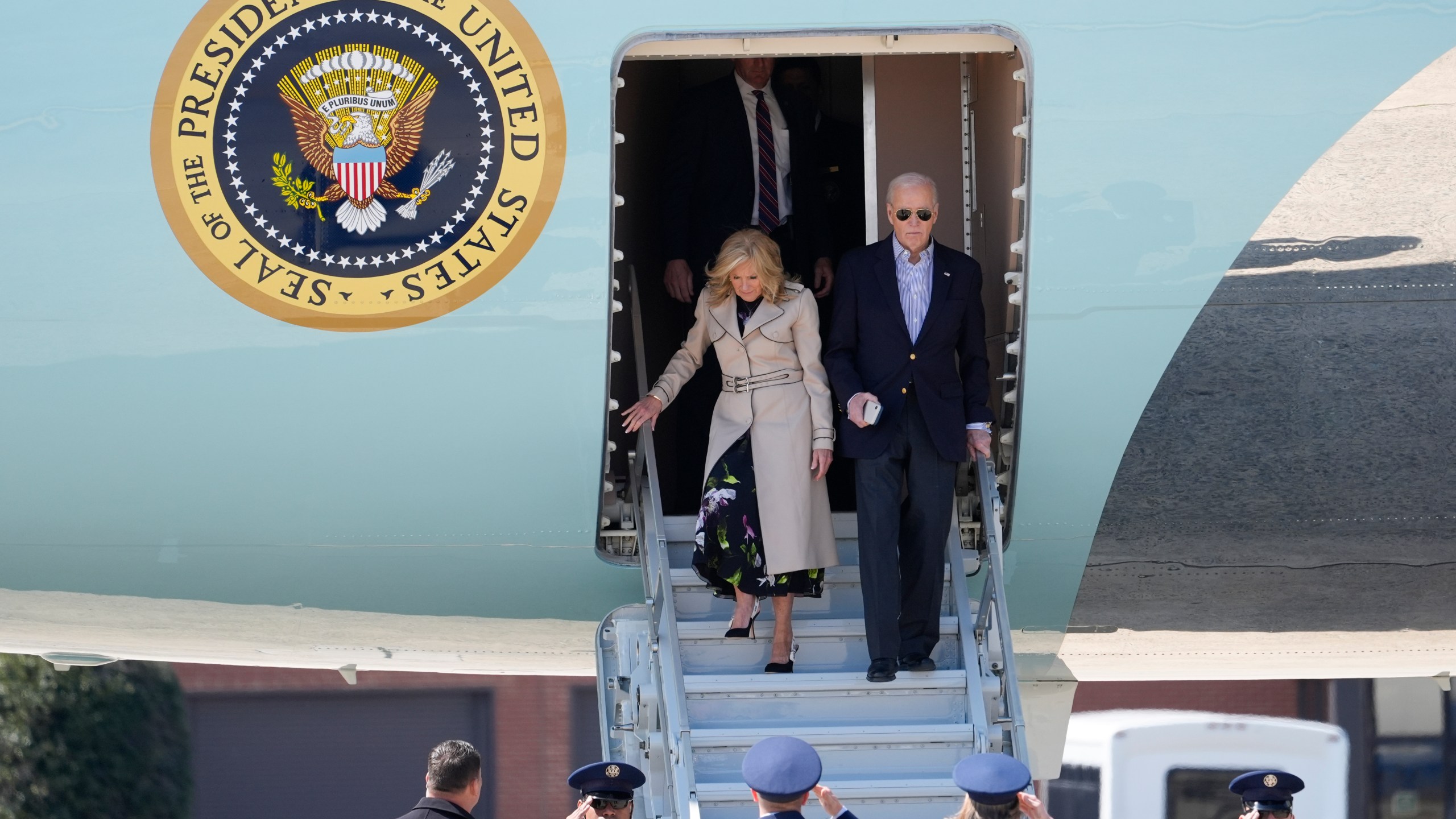President Joe Biden and first lady Jill Biden, walk off Air Force One, Friday, March 29, 2024, at Andrews Air Force Base, Md. Biden is returning from New York after a fundraiser. (AP Photo/Alex Brandon)