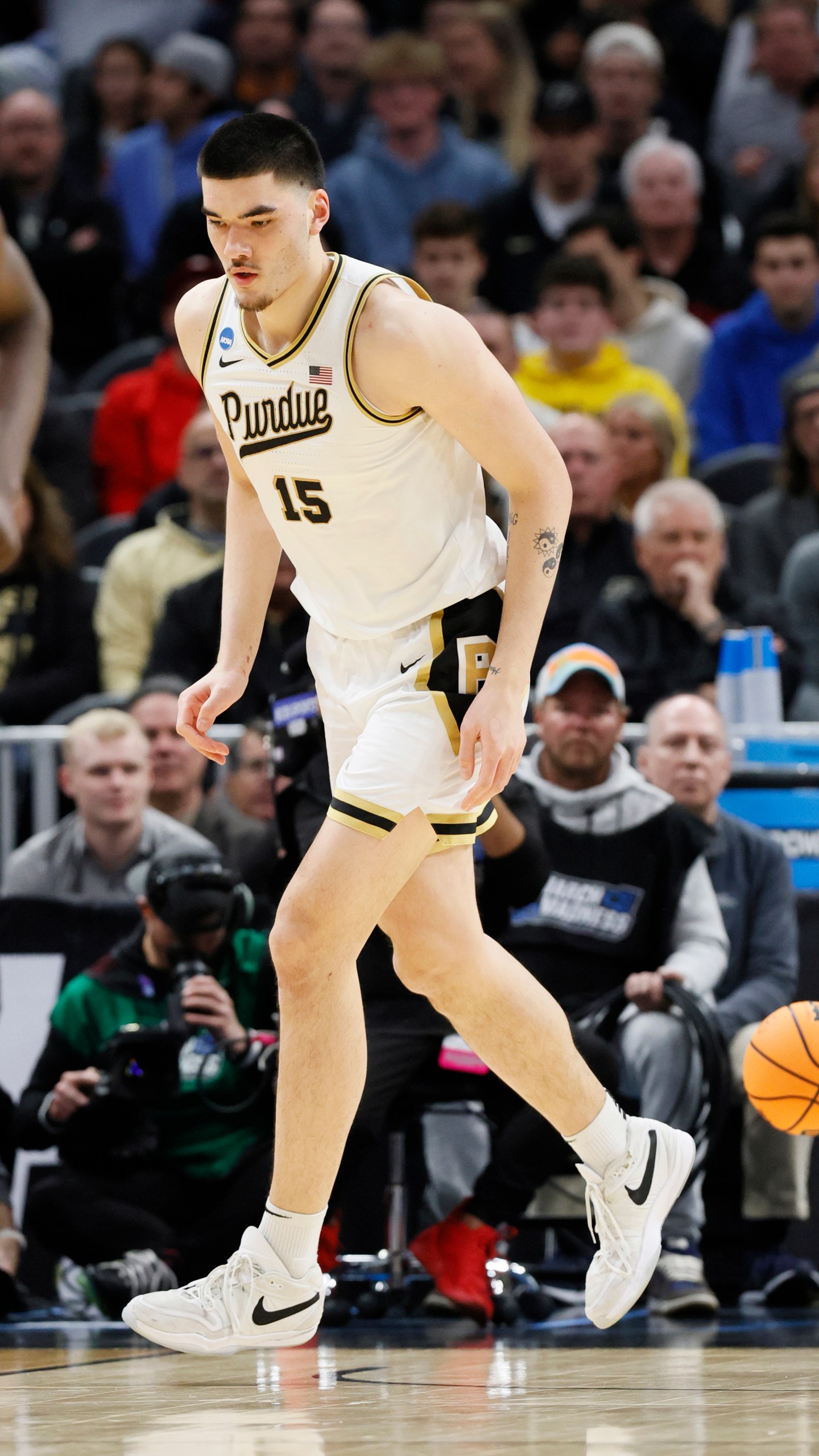 Purdue center Zach Edey runs back up court after a play during the first half of a Sweet 16 college basketball game against Gonzaga in the NCAA Tournament, Friday, March 29, 2024, in Detroit. (AP Photo/Duane Burleson)