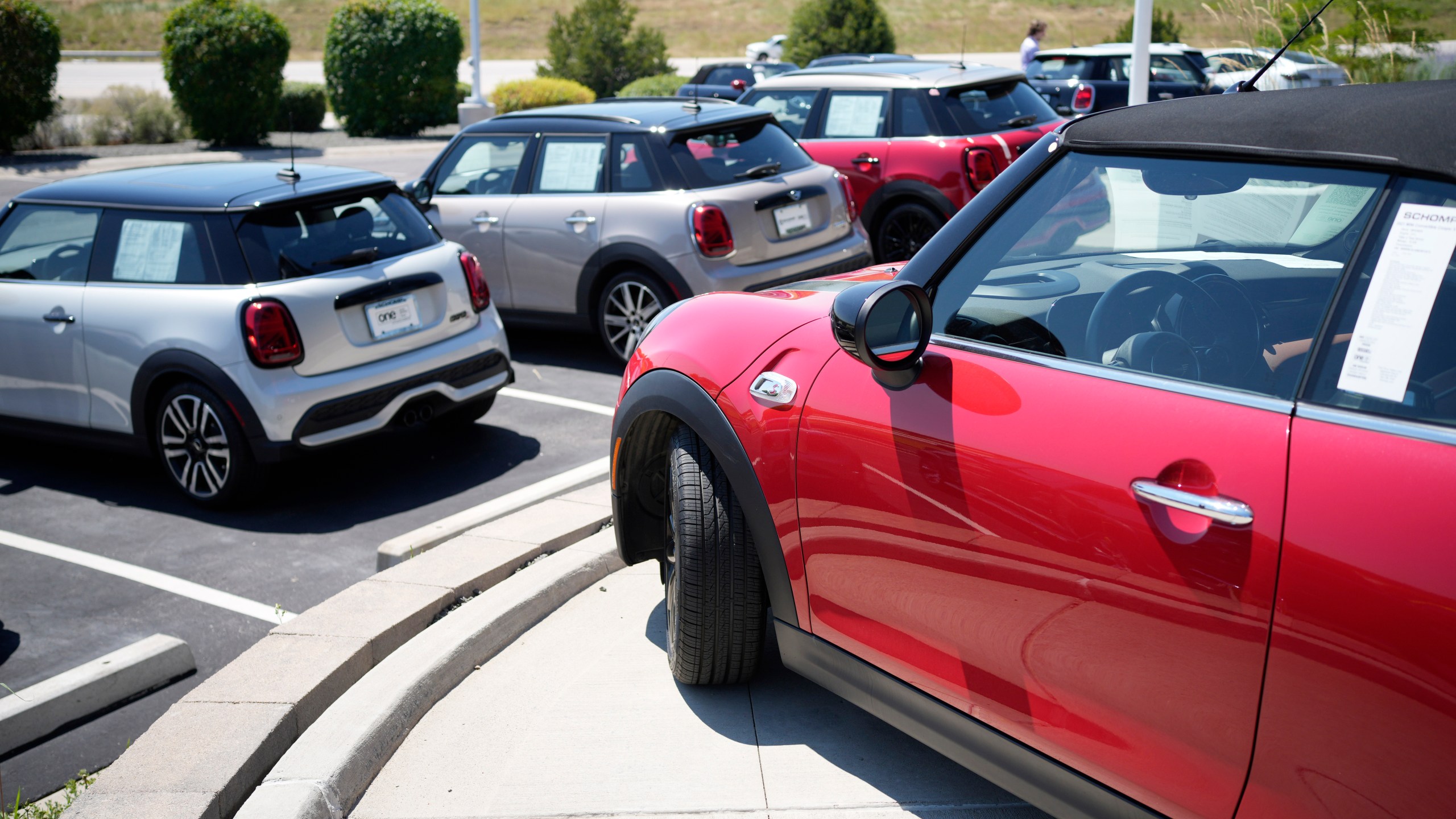 FILE - Used models are shown a Mini dealership on July 21, 2023, in Highlands Ranch, Colo. The average used car price is up 16% from three years ago. (AP Photo/David Zalubowski, File)