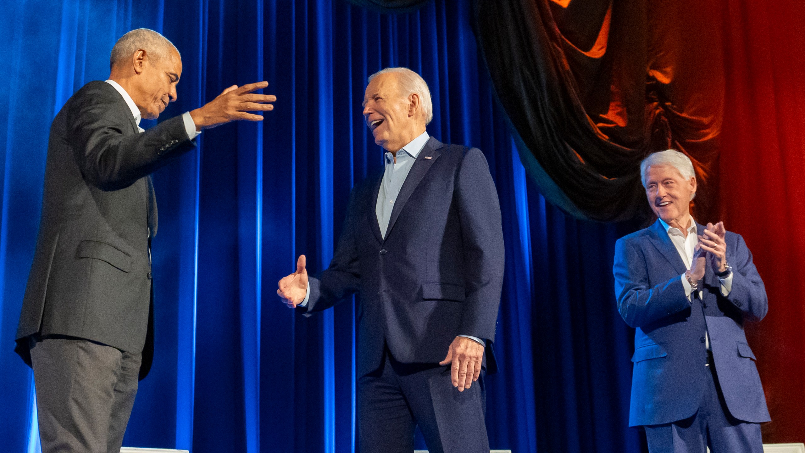 President Joe Biden, center, and former presidents Barack Obama and Bill Clinton participate in a fundraising event with Stephen Colbert at Radio City Music Hall, Thursday, March 28, 2024, in New York. (AP Photo/Alex Brandon)