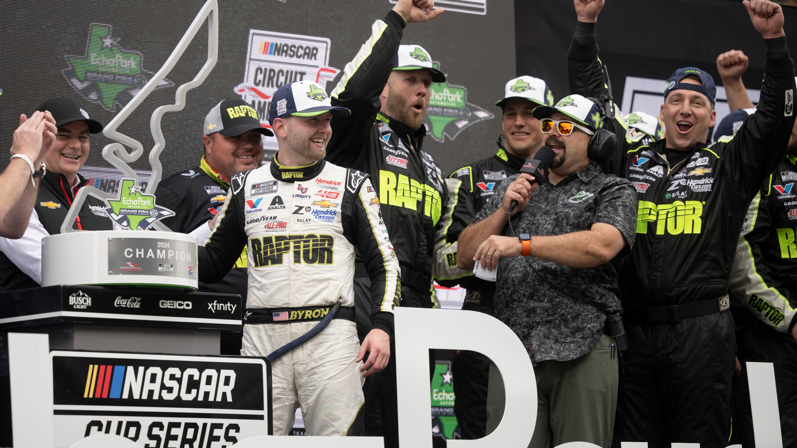 William Byron, third from left, celebrates his win after a NASCAR Cup Series auto race on Sunday, March 24, 2024, at Circuit of the Americas in Austin, Texas. (AP Photo/Darren Abate)