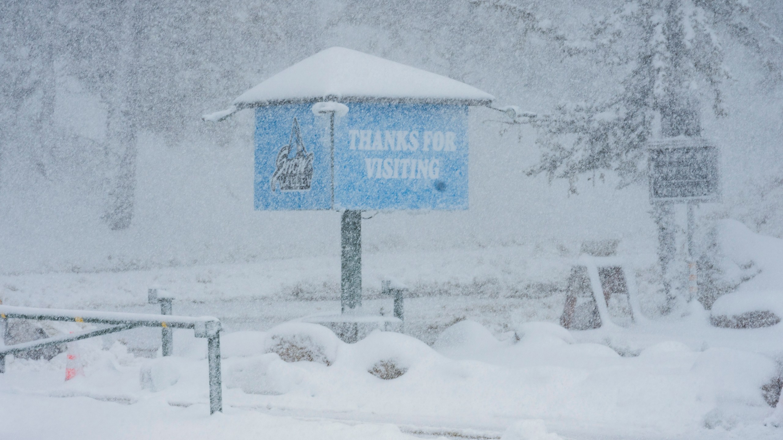 Snow falls on the Big Mountain Resort property during a storm, Saturday, March 30, 2024, in Big Bear Lake, Calif. (Big Mountain Resort via AP)