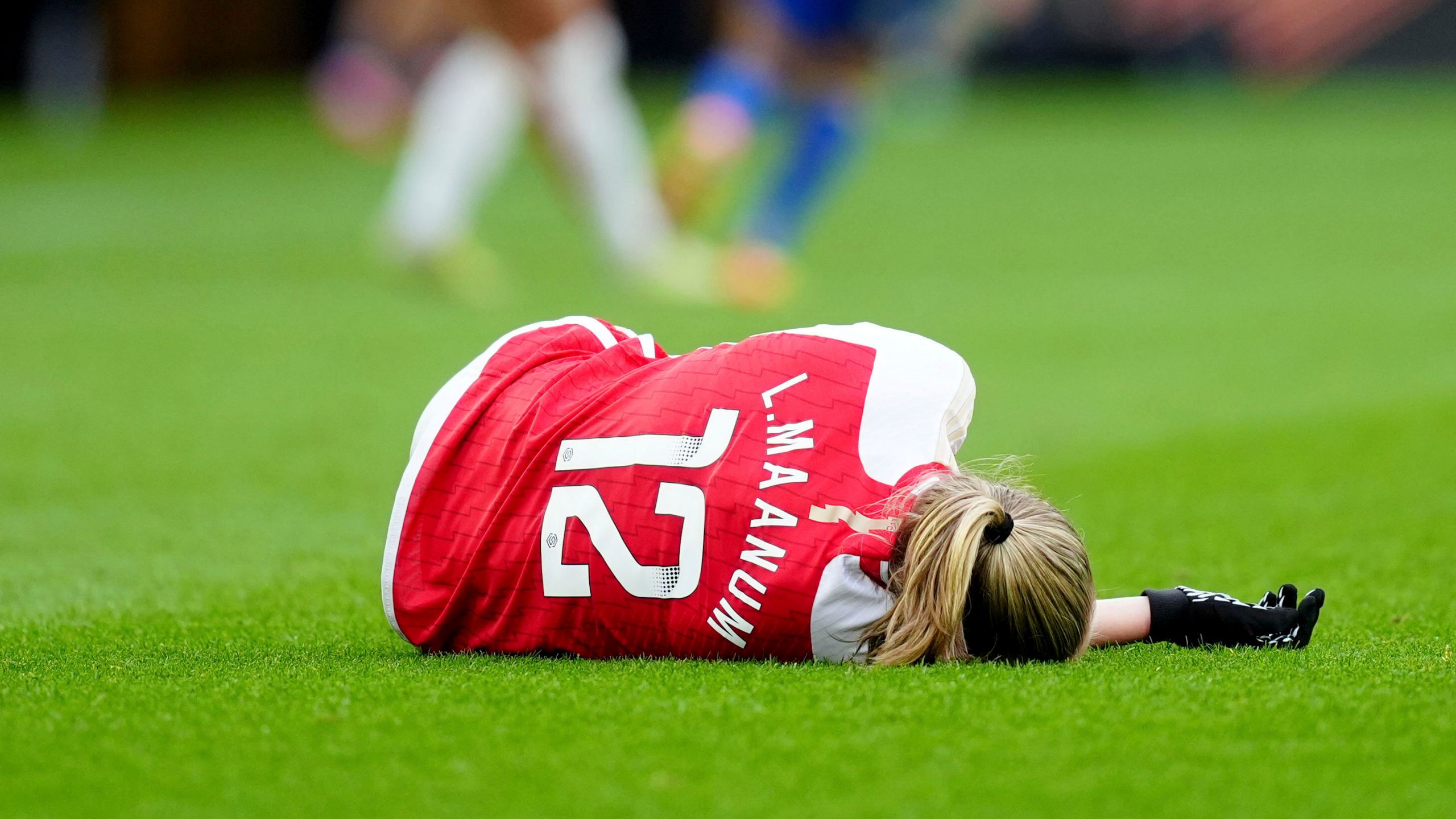 Arsenal's Frida Maanum goes down during the FA Women's Continental Tyres League Cup Final at Molineux Stadium, Wolverhampton, England, Sunday March 31, 2024. (David Davies/PA via AP)