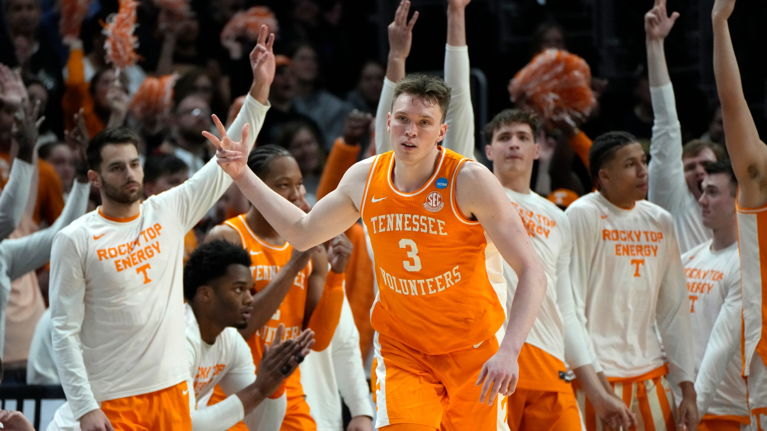 Tennessee guard Dalton Knecht (3) reacts after a three-point basket during the second half of an Elite Eight college basketball game against Purdue in the NCAA Tournament, Sunday, March 31, 2024, in Detroit. (AP Photo/Paul Sancya)