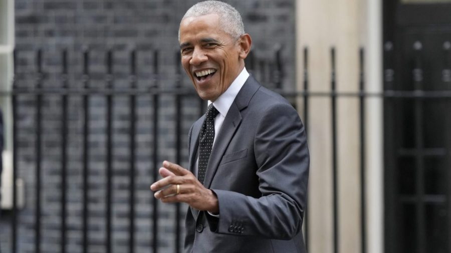 Former President Barack Obama points at the camera.