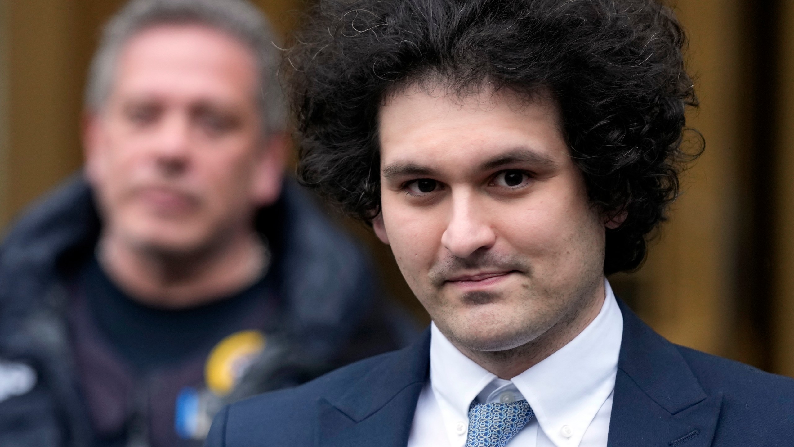 Sam Bankman-Fried leaves federal court on Feb. 16, 2023. The FTX founder was convicted of fraud and cryptocurrency crimes (AP Photo/Seth Wenig, File)