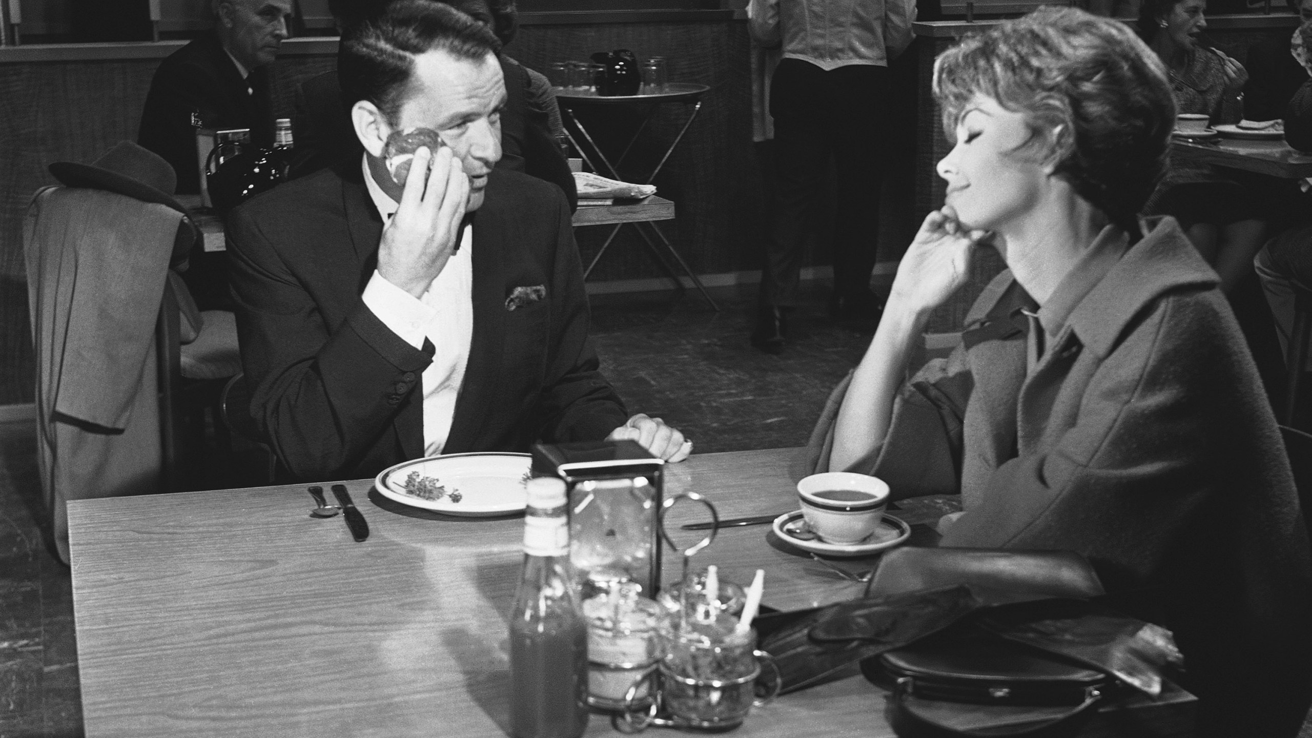 FILE - Frank Sinatra, left, appears with Barbara Rush in a scene from the film "Come Blow Your Horn" in Los Angeles on Sept. 11, 1962. Rush, who co-starred in films with Frank Sinatra, Paul Newman and other leading men of the 1950s and 1960s and had a thriving TV career later in life, died Sunday, March 31, 2024 at age 97. (AP Photo/Don Brinn, File)