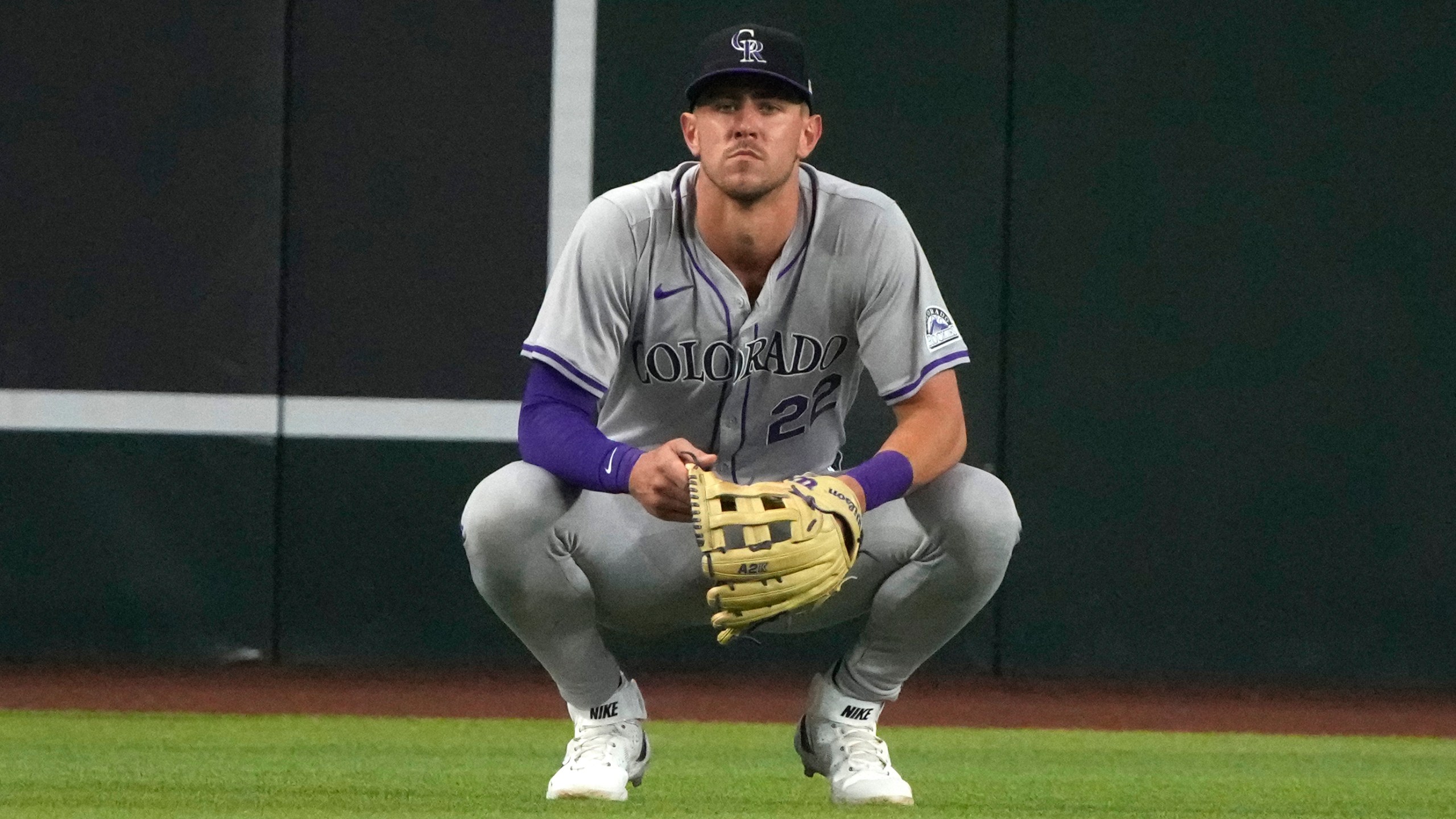 Colorado Rockies right fielder Nolan Jones reacts after dropping a fly ball hit by Arizona Diamondbacks' Ketel Marte during the fifth inning of a baseball game Sunday, March 31, 2024, in Phoenix. (AP Photo/Rick Scuteri)