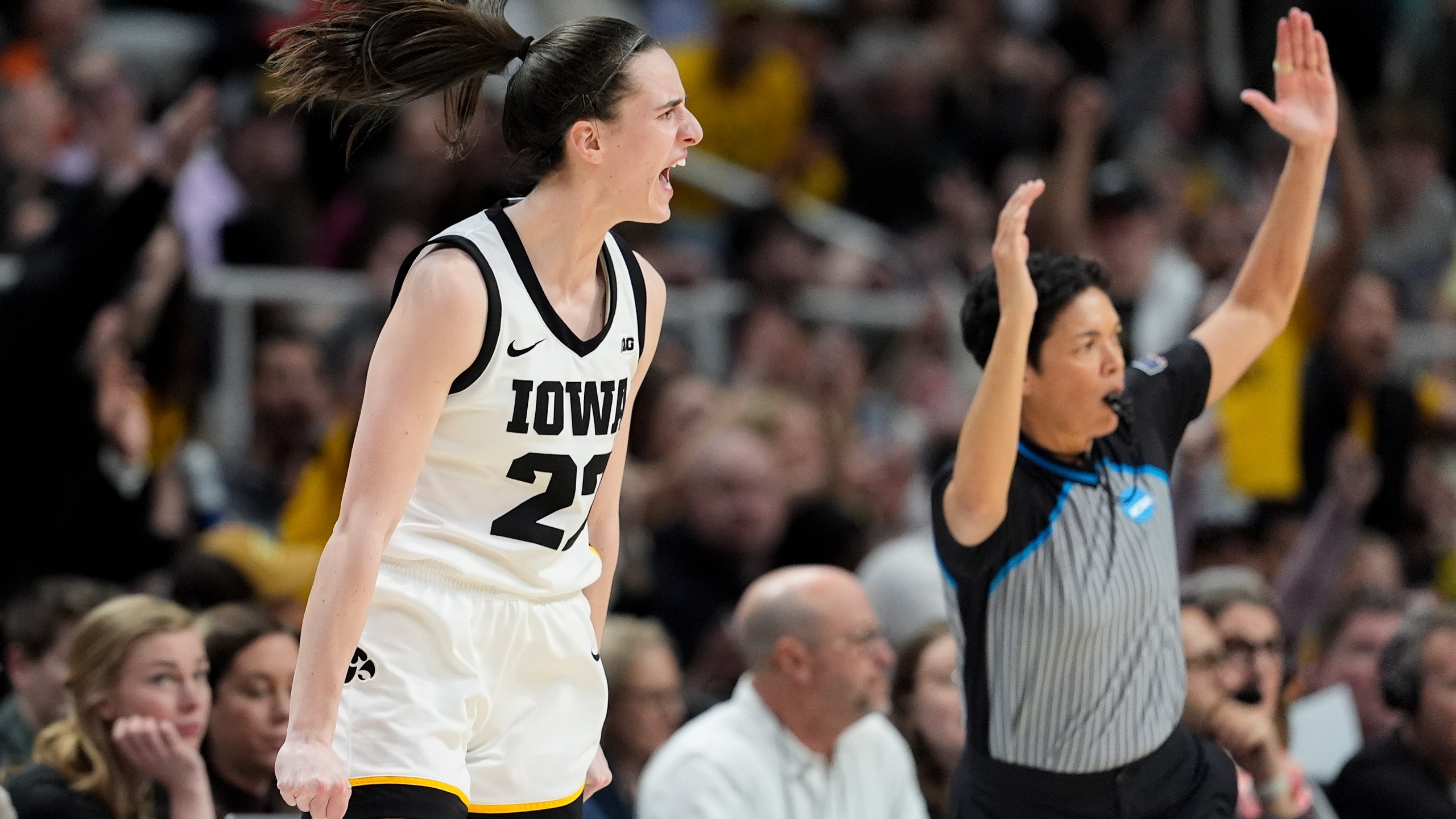 Iowa guard Caitlin Clark (22) reacts after hitting a three-point shot against LSU during the third quarter of an Elite Eight round college basketball game during the NCAA Tournament, Monday, April 1, 2024, in Albany, N.Y. (AP Photo/Mary Altaffer)