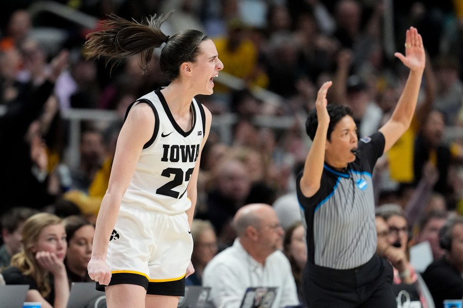 Iowa guard Caitlin Clark (22) reacts after hitting a three-point shot against LSU during the third quarter of an Elite Eight round college basketball game during the NCAA Tournament, Monday, April 1, 2024, in Albany, N.Y. (AP Photo/Mary Altaffer)