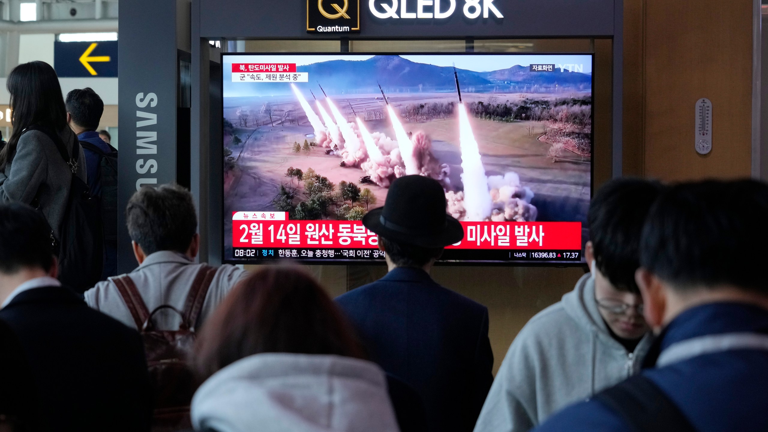 A news program airs a file image of a missile launch by North Korea at the Seoul Railway Station in Seoul, South Korea, on Tuesday, April 2, 2024. South Korea's military says it has detected that North Korea fired at least one ballistic missile toward waters off its eastern coast, adding to a series of weapons demonstrations that have raised tensions in the region. (AP Photo/Ahn Young-joon)