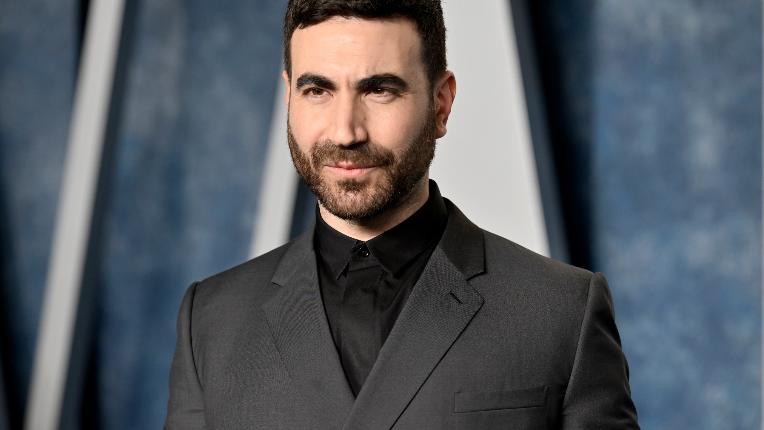 FILE - Brett Goldstein arrives at the Vanity Fair Oscar Party in Beverly Hills, Calif., on March 12, 2023. Goldstein received a Webby nomination for his podcast “Films to Be Buried With,” in which he brings on guests to discuss the movies that have most impacted their lives. (Photo by Evan Agostini/Invision/AP, File)