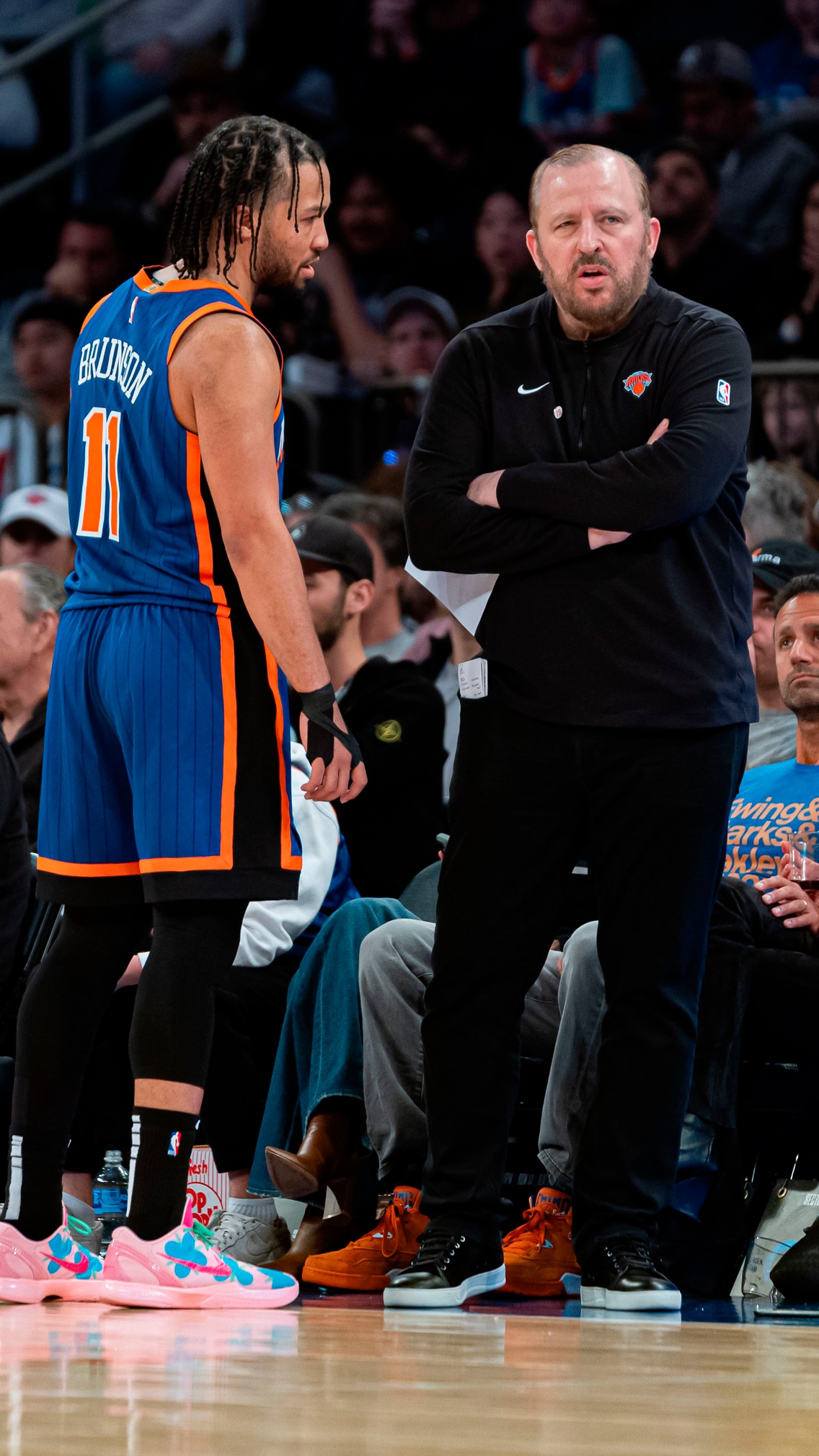 New York Knicks head coach Tom Thibodeau, right speaks with New York Knicks' Jalen Brunson (11) during the second half of an NBA basketball game against the Oklahoma City Thunder in New York, Sunday, March 31, 2024. (AP Photo/Peter K. Afriyie)