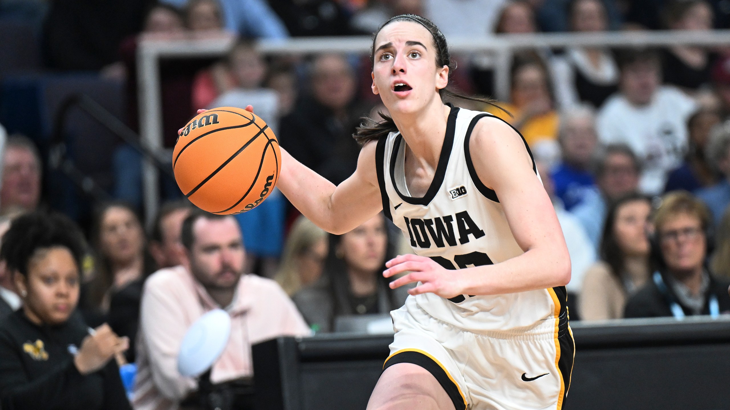 Iowa guard Caitlin Clark (22) drives to the basket against the LSU during the second half of an Elite Eight round college basketball game during the NCAA Tournament, Monday, April 1, 2024, in Albany, N.Y. (AP Photo/Hans Pennink)