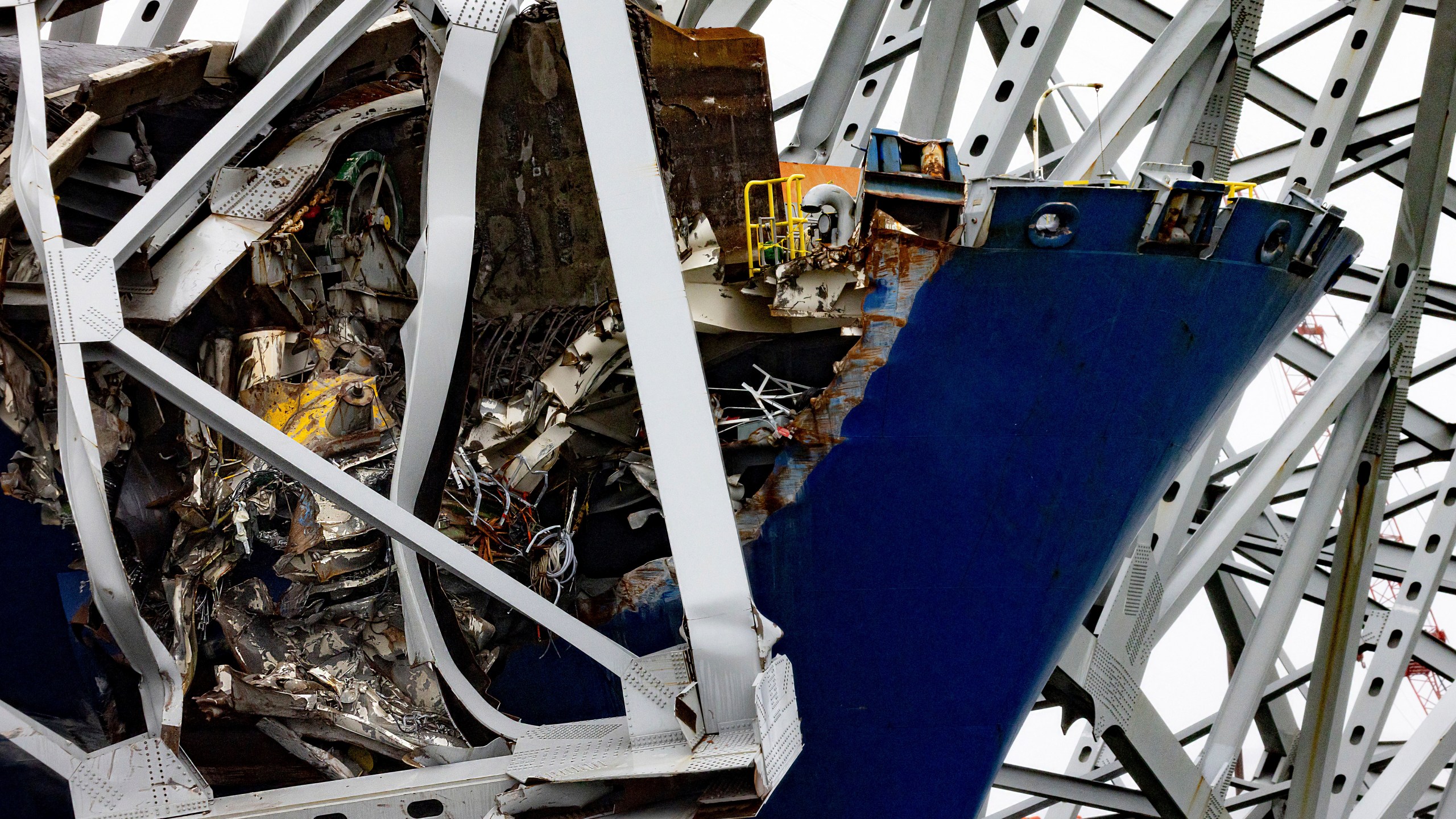 Wreckage of the Francis Scott Key Bridge rests on the container ship Dali, Wednesday, April 3, 2024, in Baltimore. (AP Photo/Julia Nikhinson)