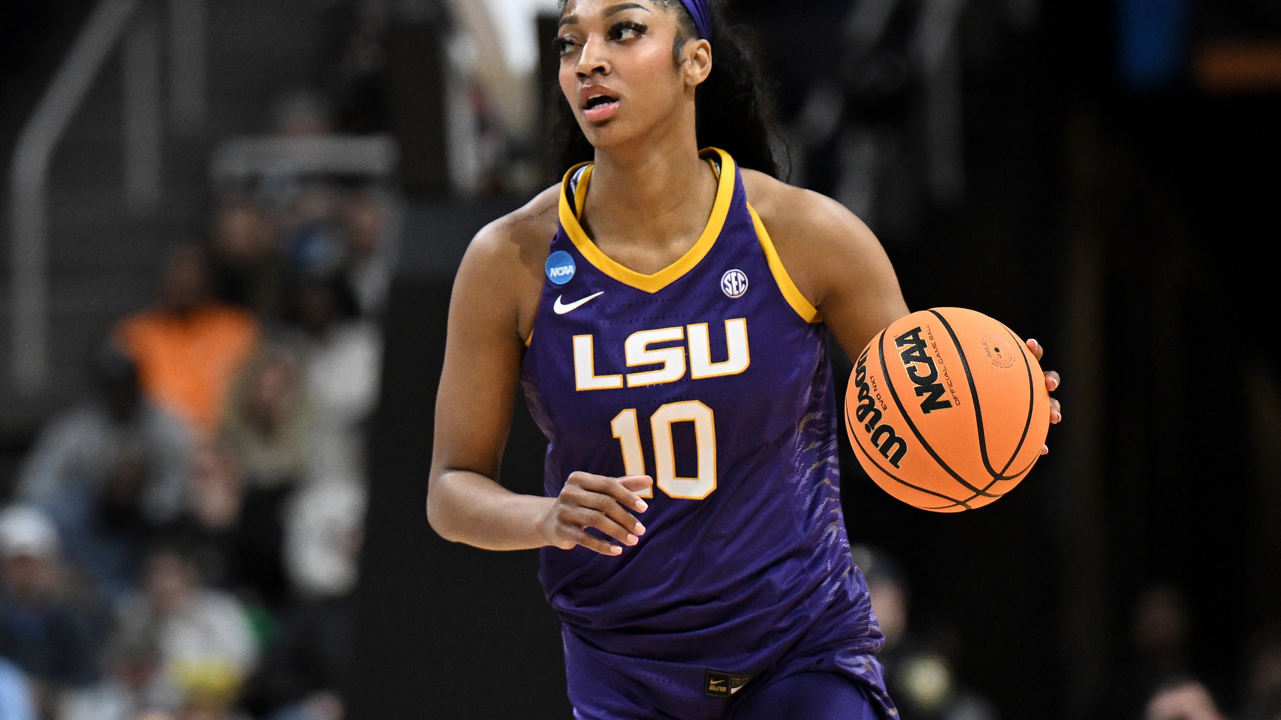 LSU forward Angel Reese (10) brings the ball up court during the first quarter of an Elite Eight round college basketball game against Iowa during the NCAA Tournament, Monday, April 1, 2024, in Albany, N.Y. (AP Photo/Hans Pennink)