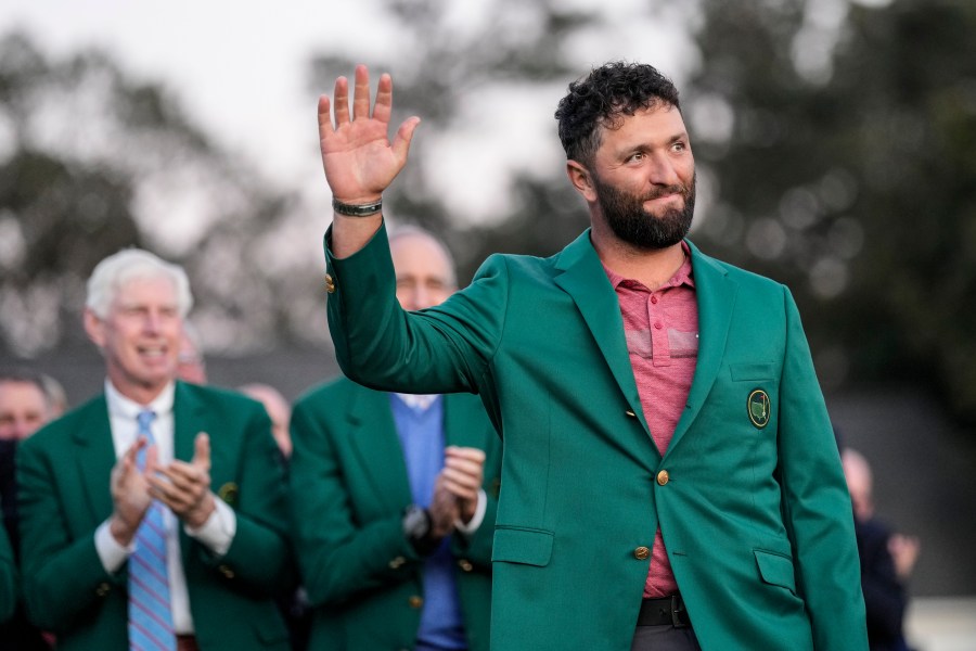 FILE - Jon Rahm, of Spain, celebrates winning the Masters golf tournament at Augusta National Golf Club on Sunday, April 9, 2023, in Augusta, Ga. Rahm returns to defend his title as a member of LIV Golf. (AP Photo/David J. Phillip, File)