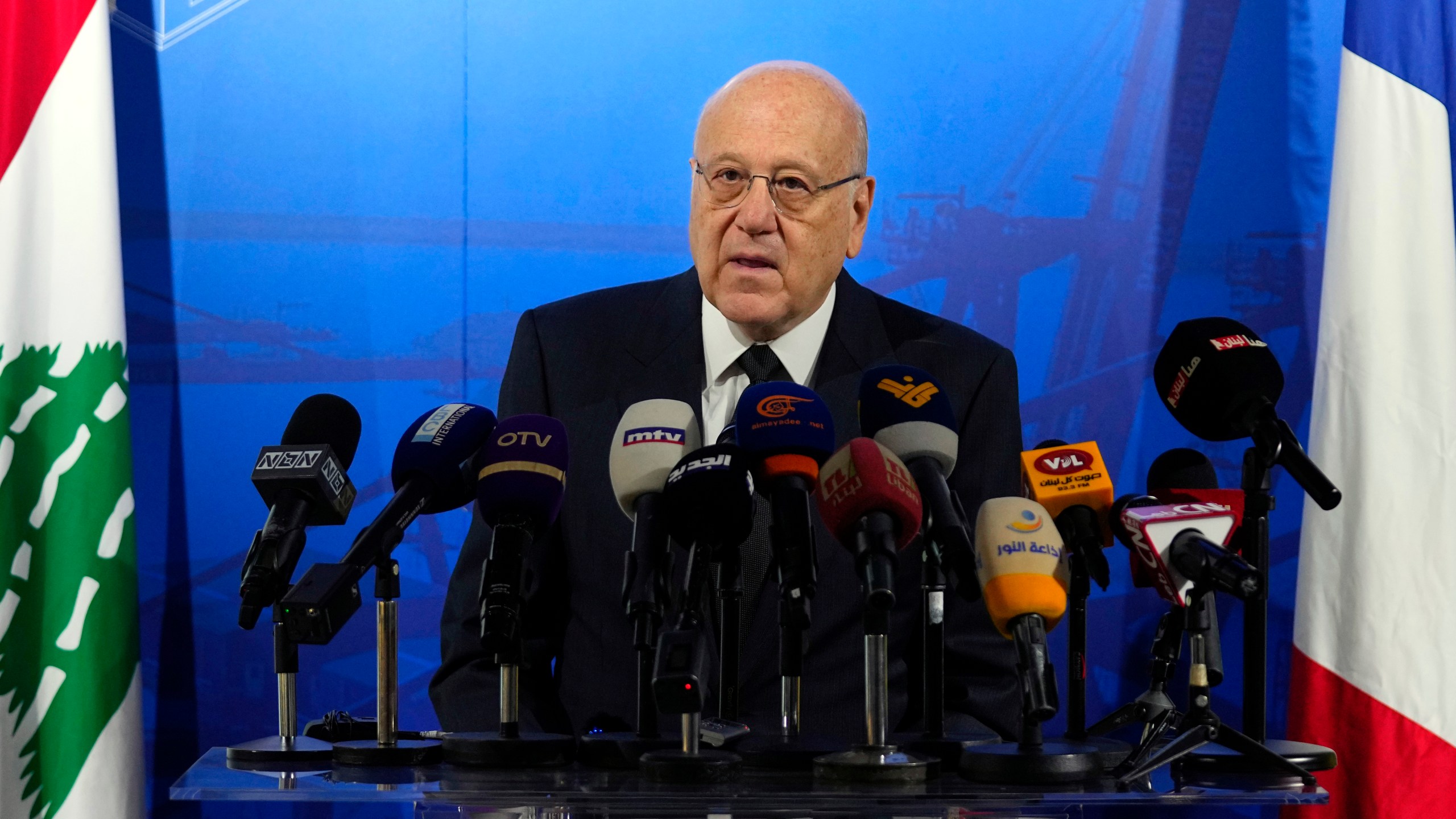 FILE - Lebanese caretaker Prime Minister Najib Mikati speaks during a conference announcing a French reconstruction plan for the Beirut Port, in Beirut, Lebanon, Wednesday, March 13, 2024. Mikati has denied all allegations of money laundering after a complaint was filed in France by two anti-corruption groups this week. The complaint against Najib Mikati was formally filed Tuesday, April 2, 2024, to France’s National Financial Prosecutor’s office by French anti-corruption non-governmental organization Sherpa and the Collective of Victims of Fraudulent and Criminal Practices. (AP Photo/Bilal Hussein, File)
