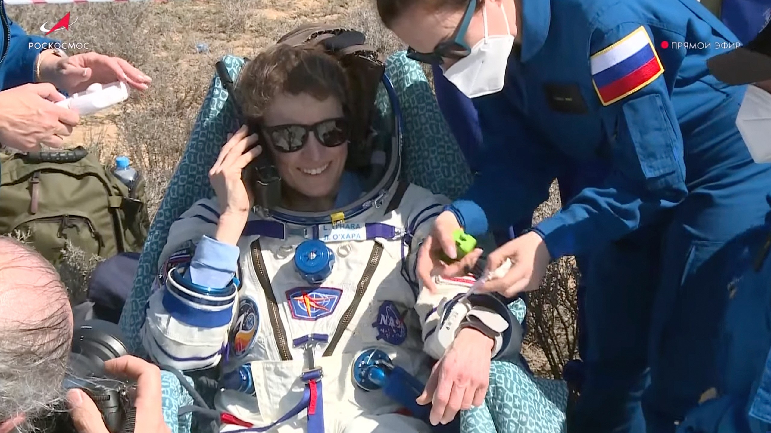 In this grab taken from video released by the Roscosmos Space Corporation, NASA astronaut Loral O'Hara sits in a chair shortly after the landing of the Russian Soyuz MS-24 space capsule near the town of Zhezkazgan, Kazakhstan, Saturday, April 6, 2024. The Soyuz capsule carrying NASA astronaut Loral O'Hara, Oleg Novitsky of Roscosmos and Marina Vasilevskaya of Belarus touched down on Saturday. (Roscosmos space corporation via AP)