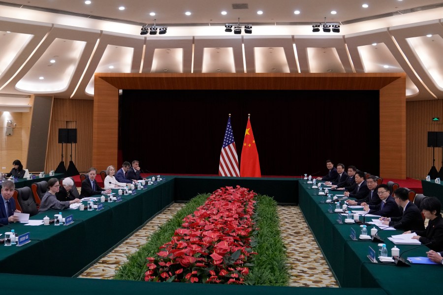 U.S. Treasury Secretary Janet Yellen, third from left, and Chinese Vice Premier He Lifeng, fourth from right, sit for a bilateral meeting at the Guangdong Zhudao Guest House in southern China's Guangdong province, Saturday, April 6, 2024. (AP Photo/Andy Wong, Pool)