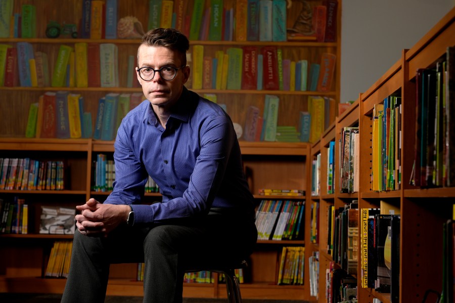 Tom Bober, librarian and President of the Missouri Association of School Librarians, poses for a photo Wednesday, March 20, 2024, in Clayton, Mo. (AP Photo/Jeff Roberson)