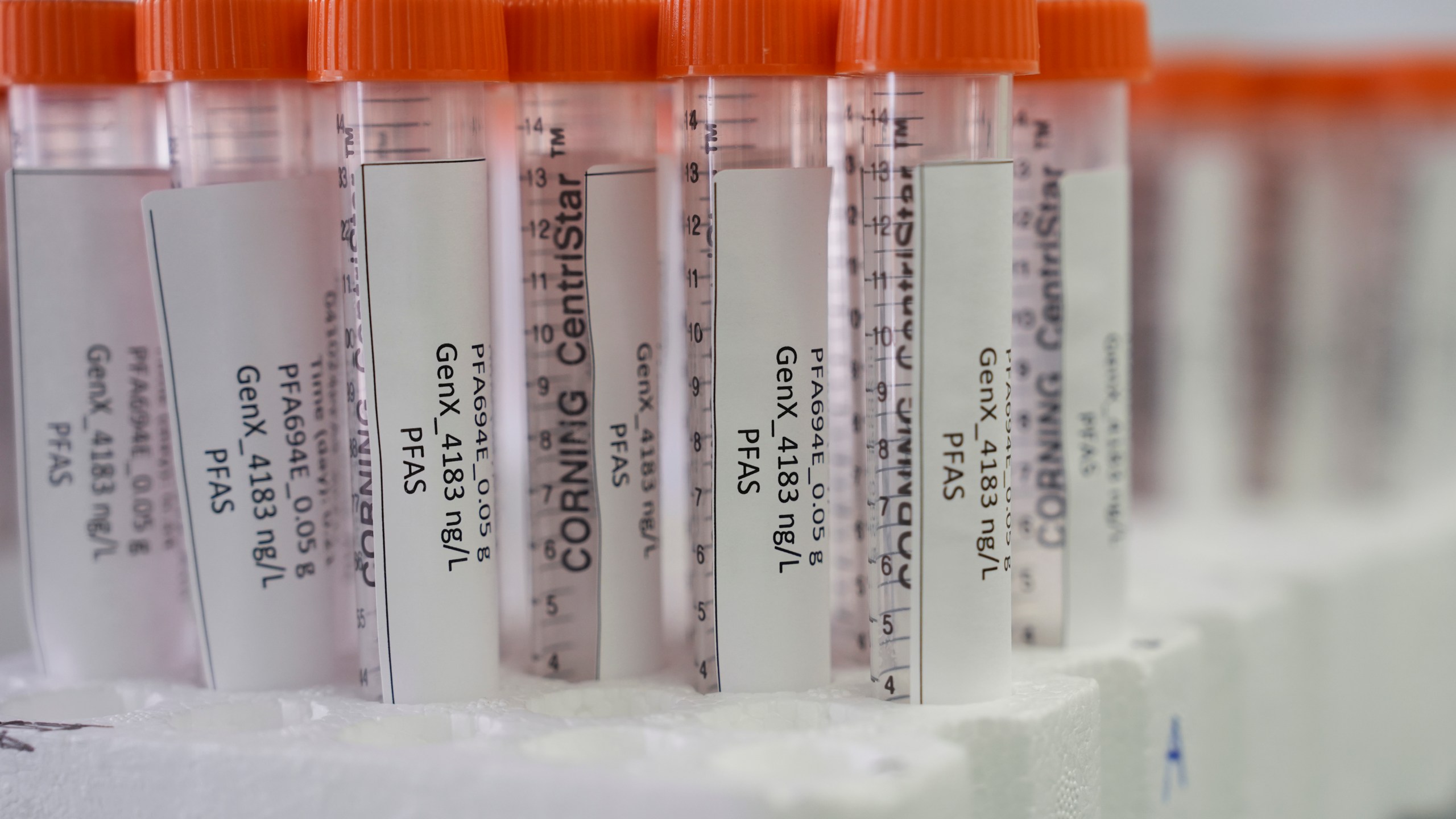 Vials containing PFAS samples sit in a tray, Wednesday, April 10, 2024, at a U.S. Environmental Protection Agency lab in Cincinnati. The Environmental Protection Agency on Wednesday announced its first-ever limits for several common types of PFAS, the so-called "forever chemicals," in drinking water. (AP Photo/Joshua A. Bickel)