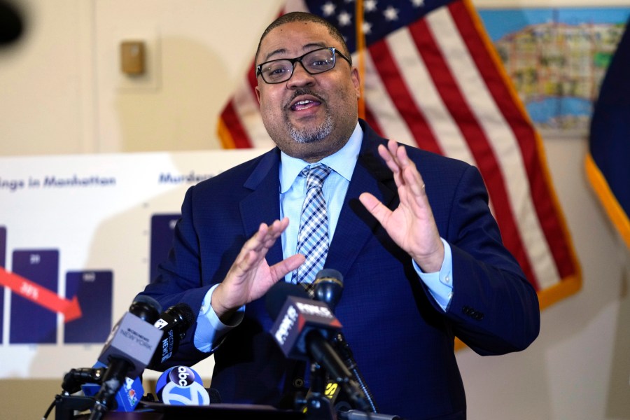 FILE - Manhattan District Attorney Alvin Bragg gestures while speaking during a news conference Feb. 22, 2024, in New York. As he prepares to bring the first of Donald Trump's four criminal prosecutions to trial, Bragg finds himself at the center of a political firestorm. The upcoming trial, over hush money payments allegedly made by Trump during the 2016 election, will test Bragg's efforts to portray himself as apolitical in the face of relentless attacks from Trump and his supporters. The trial is scheduled to begin on Monday, April 15. (AP Photo/Frank Franklin II, File)