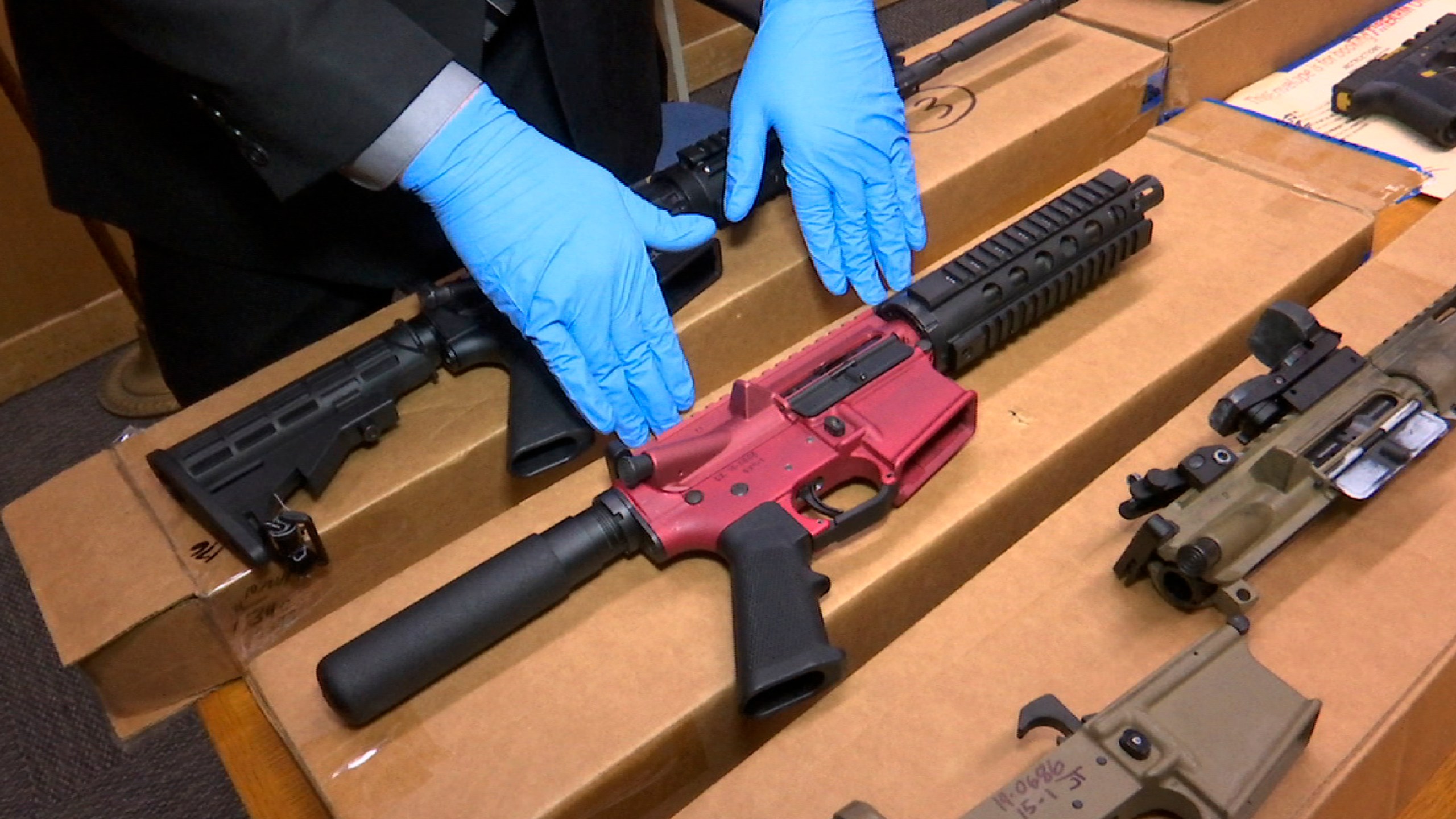 FILE - "Ghost guns" are displayed at the headquarters of the San Francisco Police Department in San Francisco, Nov. 27, 2019. Two gun parts manufacturers have agreed to halt sales of their products in Philadelphia and elsewhere in Pennsylvania, city officials said Thursday, April 11, 2024, announcing a settlement of their lawsuit against the companies. Philadelphia filed suit against Polymer80 and JSD Supply in July 2023, accusing the manufacturers of perpetuating gun violence in the city by manufacturing and selling untraceable, self-manufactured weapons commonly known as “ghost guns.” (AP Photo/Haven Daley, File)