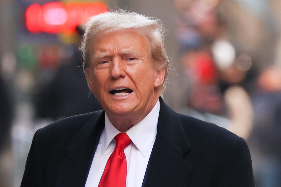 FILE - Former President Donald Trump comments as he arrives for a press conference, March 25, 2024, in New York. Trump is set to stand trial Monday, April 15, in New York on state charges related to the very sex scandal that he and his aides strove to hide. Barring a last-minute delay, it will be the first of Trump's four criminal cases to go to trial. (AP Photo/Yuki Iwamura, File)