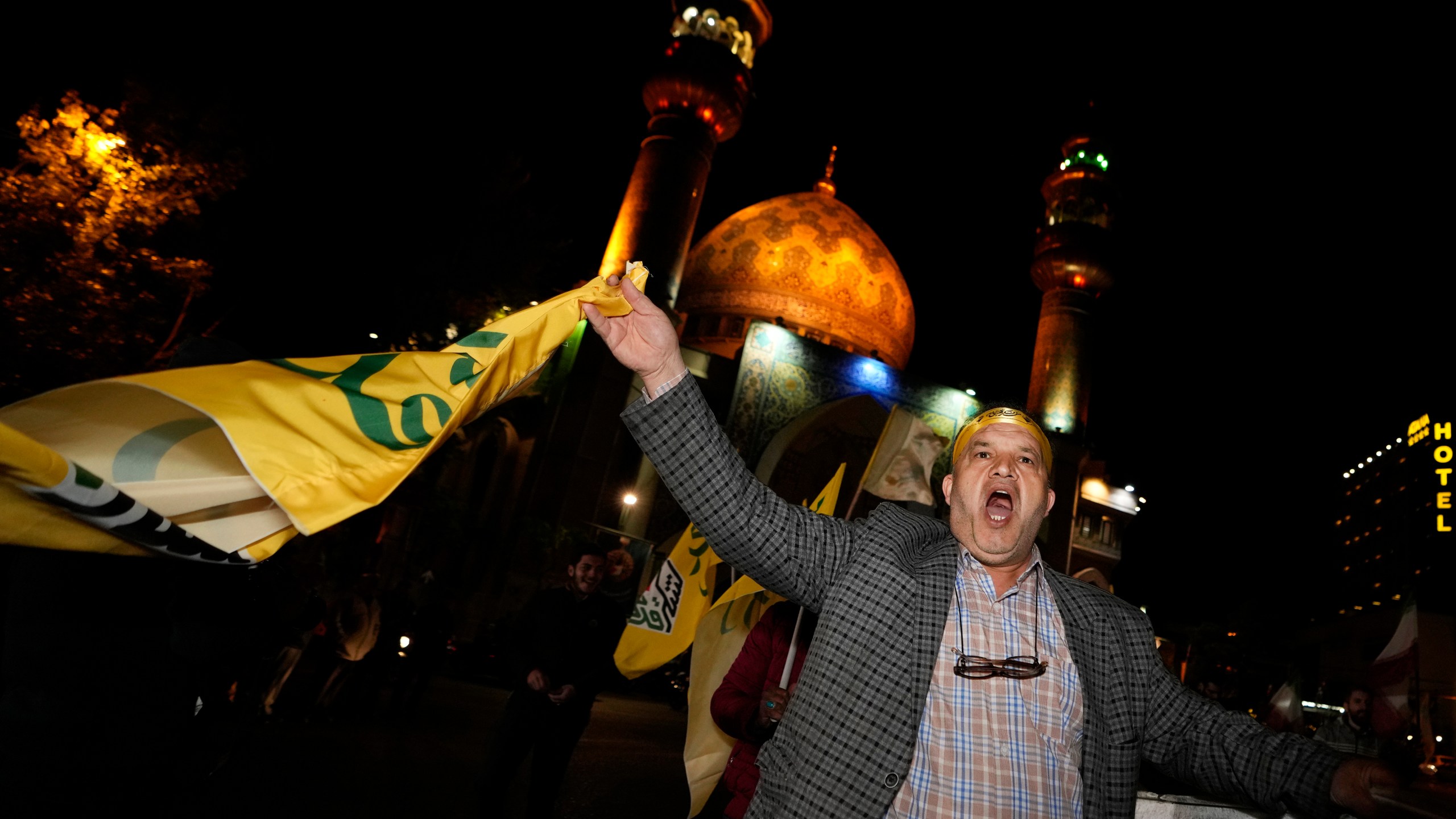 An Iranian demonstrator chants slogans while attending an anti-Israeli gathering at the Felestin (Palestine) Square in Tehran, Iran, early Sunday, April 14, 2024. Iran launched its first direct military attack against Israel Saturday. The Israeli military says Iran fired more than 100 bomb-carrying drones toward Israel. Hours later, Iran announced it had also launched much more destructive ballistic missiles. (AP Photo/Vahid Salemi)