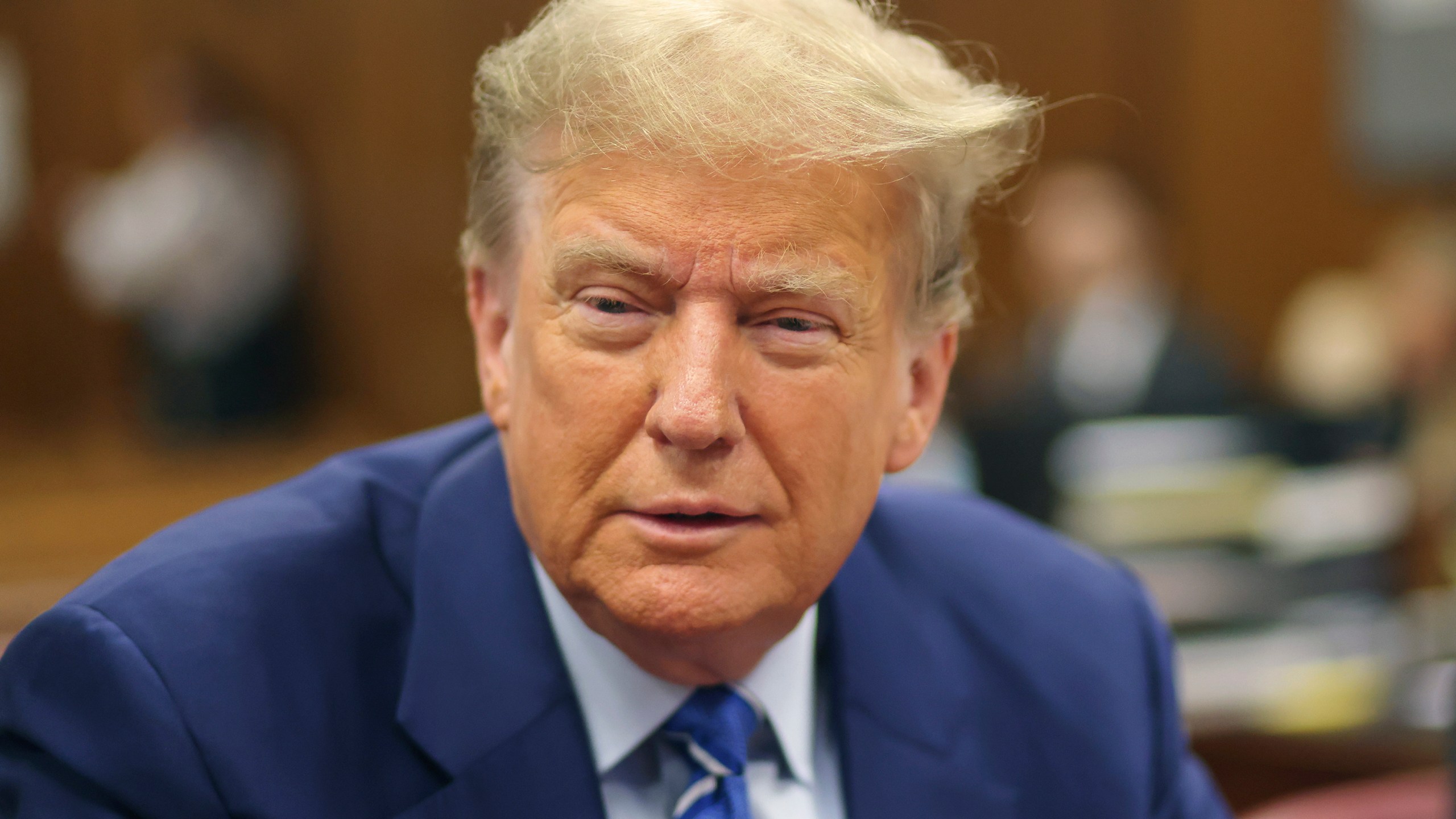 Former President Donald Trump awaits the start of proceedings on the second day of jury selection at Manhattan criminal court, Tuesday, April 16, 2024, in New York. Trump returned to the courtroom Tuesday as a judge works to find a panel of jurors who will decide whether the former president is guilty of criminal charges alleging he falsified business records to cover up a sex scandal during the 2016 campaign. (Michael M. Santiago/Pool Photo via AP)