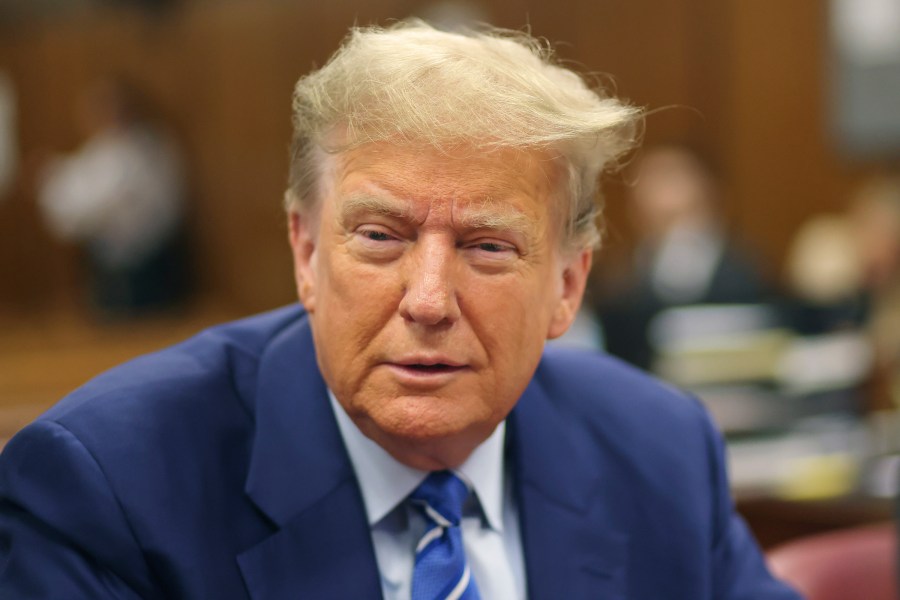 Former President Donald Trump awaits the start of proceedings on the second day of jury selection at Manhattan criminal court, Tuesday, April 16, 2024, in New York. Trump returned to the courtroom Tuesday as a judge works to find a panel of jurors who will decide whether the former president is guilty of criminal charges alleging he falsified business records to cover up a sex scandal during the 2016 campaign. (Michael M. Santiago/Pool Photo via AP)