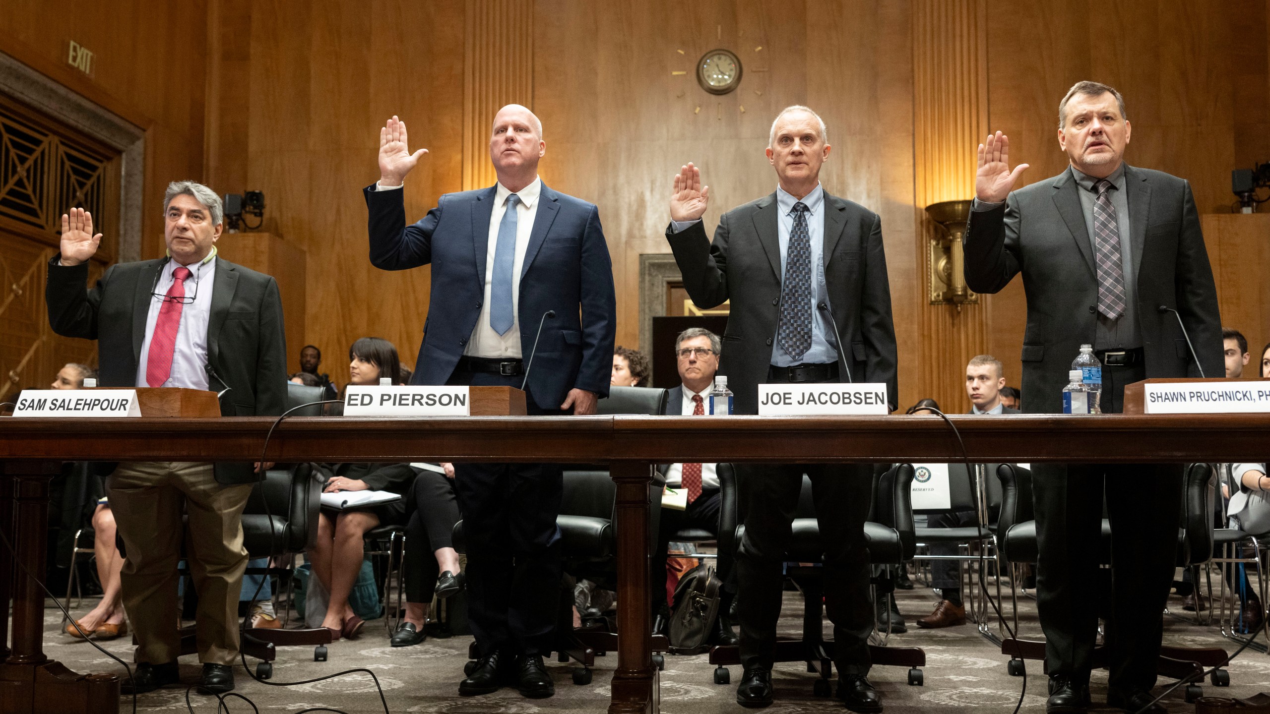 From Left, Boeing Quality Engineer Sam Salehpour; Ed Pierson, Executive Director of The Foundation for Aviation Safety and a Former Boeing Engineer; Joe Jacobsen, Aerospace Engineer and Technical Advisor to the Foundation for Aviation Safety and a former FAA Engineer; and Shawn Pruchnicki, Ph.D, Professional Practice Assistant Professor for Integrated Systems Engineering at The Ohio State University are sworn in before they testify at a Senate Homeland Security and Governmental Affairs - Subcommittee on Investigations hearing to examine Boeing's broken safety culture on Wednesday, April 17, 2024, in Washington. (AP Photo/Kevin Wolf)