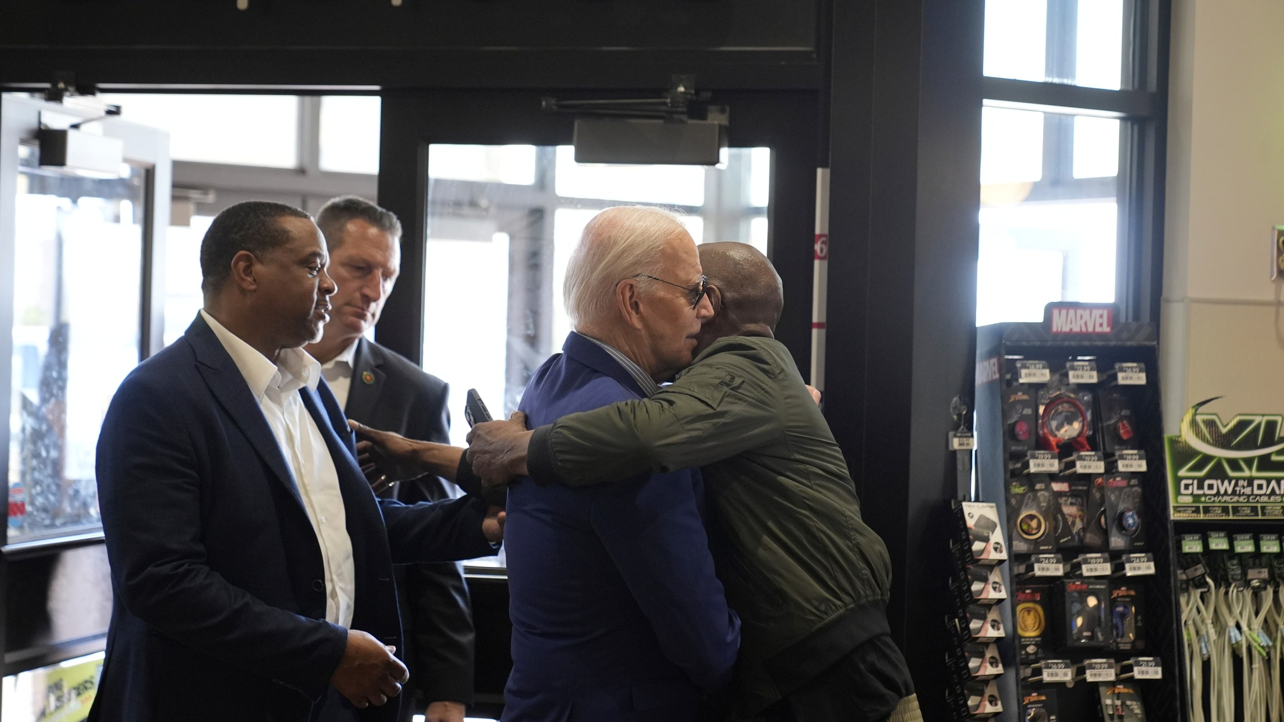 President Joe Biden is greeted after walking into a Sheetz after stopping enroute to Pittsburgh International Airport, Wednesday, April 17, 2024, in Pittsburgh, Pa. (AP Photo/Alex Brandon))