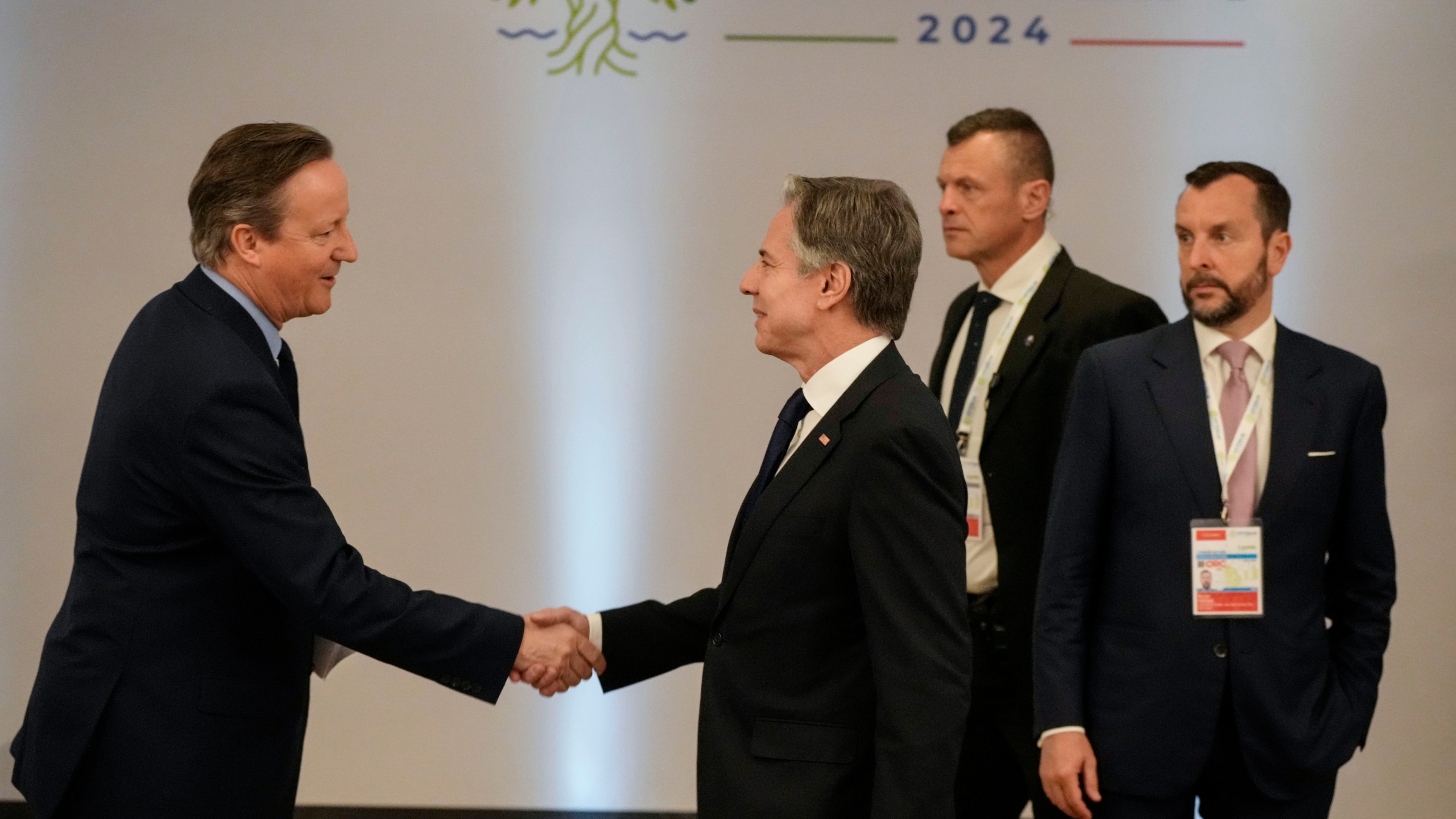 U.S. Secretary of State Antony Blinken, right, shakes hand with Britain's Foreign Secretary David Cameron as they attend an Indo-Pacific meeting on the sidelines of the G7 Foreign Ministers meeting on Capri Island, Italy, Friday, April 19, 2024. (AP Photo/Gregorio Borgia, Pool)