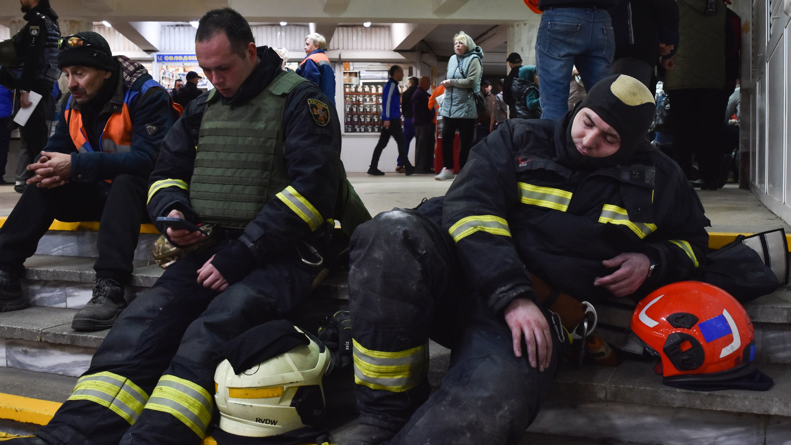 People take shelter in a metro station during an air-raid alarm in Dnipro, Ukraine, Friday, April 19, 2024. (AP Photo/Andriy Andriyenko)