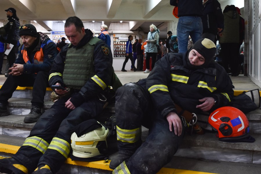 People take shelter in a metro station during an air-raid alarm in Dnipro, Ukraine, Friday, April 19, 2024. (AP Photo/Andriy Andriyenko)