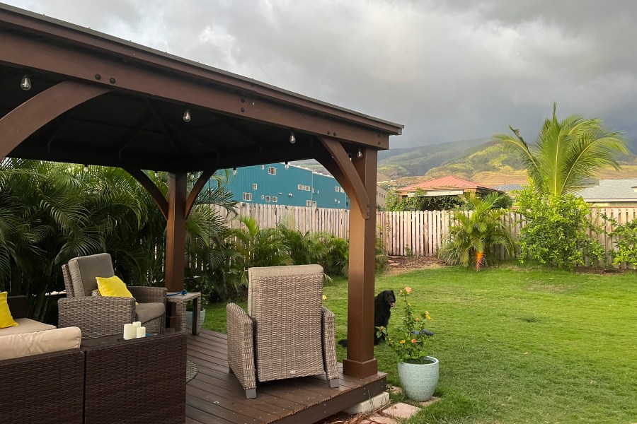 This July 2023 image provided by Amy Chadwick shows the backyard of her home in Lahaina, on the Hawaiian island of Maui. The home was destroyed in the Lahaina wildfire. Chadwick moved to Florida where she could stretch her homeowners insurance dollars. She's worried Maui's exorbitant rental prices, which she blames in part on vacation rentals hogging up limited housing supply, will hollow out her tight-knit town by similarly forcing others to leave. (Amy Chadwick via AP)