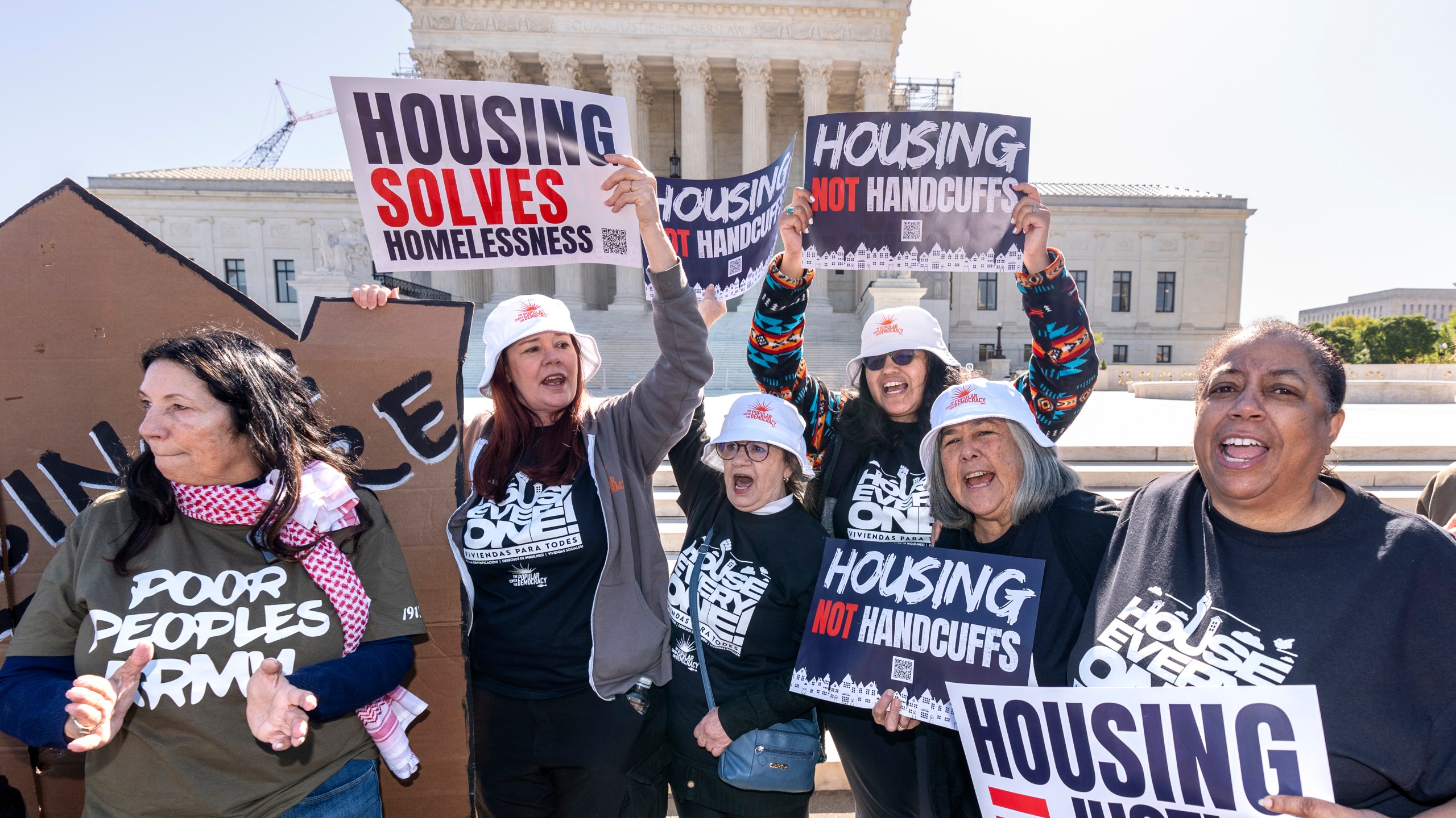 Activists demonstrate at the Supreme Court as the justices consider a challenge to rulings that found punishing people for sleeping outside when shelter space is lacking amounts to unconstitutional cruel and unusual punishment, on Capitol Hill in Washington, Monday, April 22, 2024. (AP Photo/J. Scott Applewhite)