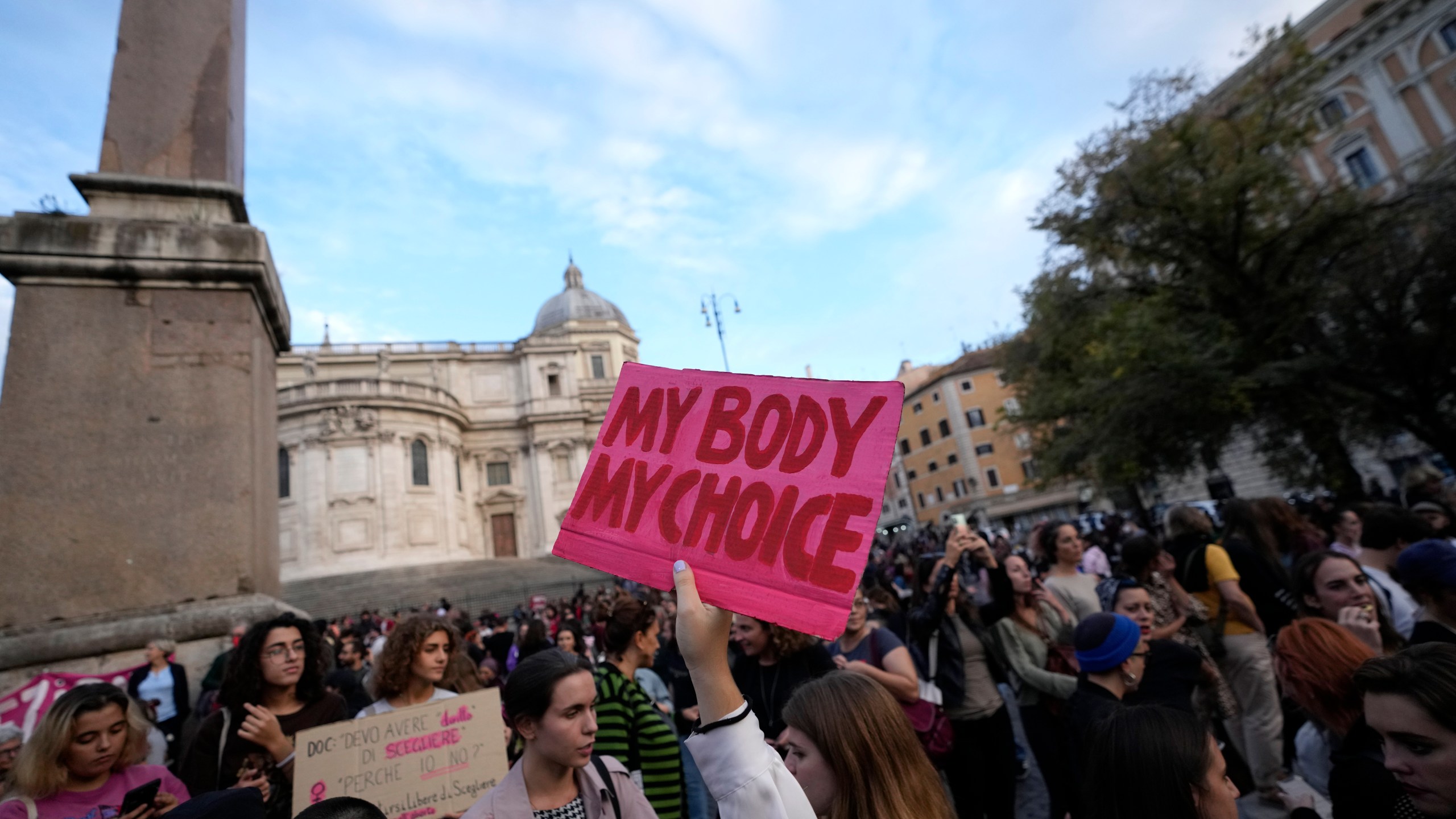 FILE - People stage a protest on 'International Safe Abortion Day' to ask for more guarantees on the enforcement of the abortion law that they claim is seriously endangered by the high rate of doctors' conscientious objection in the country, in Rome, Wednesday, Sept. 28, 2022. Premier Giorgia Meloni’s far-right-led government wants to allow anti-abortion groups access to women considering interrupting their pregnancies, making abortion a flashpoint argument in Italy 46 years after it was legalized in the overwhelmingly Catholic country. The Senate on Tuesday, April 23, 2024, was voting on procedural legislation tied to EU COVID-19 recovery funds that includes an amendment sponsored by Meloni’s Brothers of Italy party. (AP Photo/Alessandra Tarantino, file)