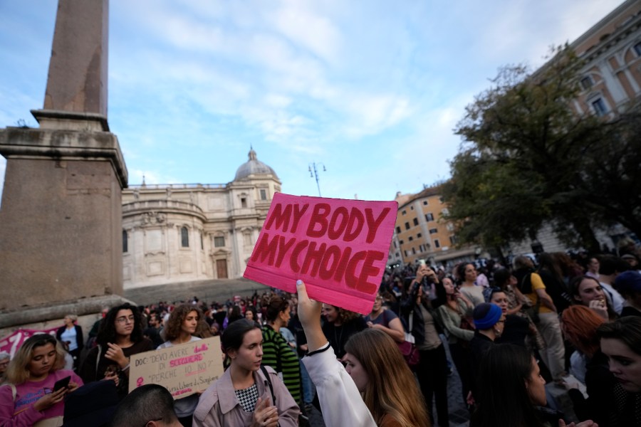 FILE - People stage a protest on 'International Safe Abortion Day' to ask for more guarantees on the enforcement of the abortion law that they claim is seriously endangered by the high rate of doctors' conscientious objection in the country, in Rome, Wednesday, Sept. 28, 2022. Premier Giorgia Meloni’s far-right-led government wants to allow anti-abortion groups access to women considering interrupting their pregnancies, making abortion a flashpoint argument in Italy 46 years after it was legalized in the overwhelmingly Catholic country. The Senate on Tuesday, April 23, 2024, was voting on procedural legislation tied to EU COVID-19 recovery funds that includes an amendment sponsored by Meloni’s Brothers of Italy party. (AP Photo/Alessandra Tarantino, file)